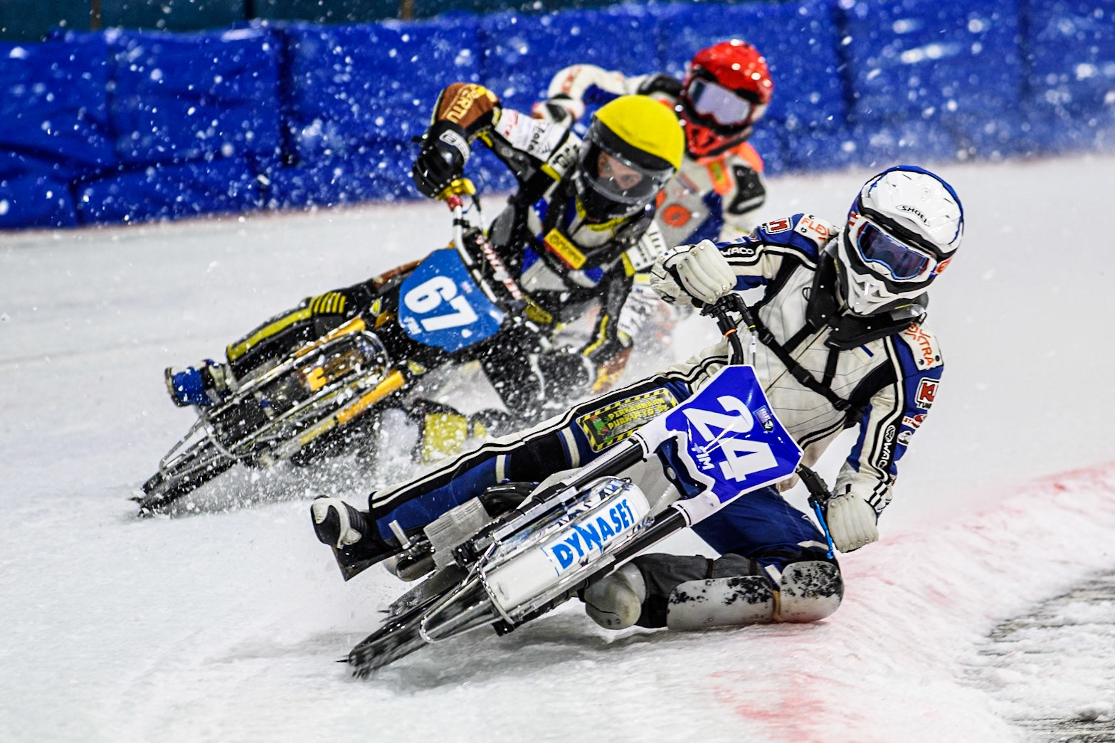 Max Koivula (24) of Finland in Blue leading Heikki Huusko (67) of Finland in Yellow and Jasper Iwema (800) of The Netherlands in Red during the FIM Ice Speedway Gladiators World Championship, Final 4 at the Ice Stadium, Thialf, Heerenveen on Sunday 6th April 2025. (Photo: Ian Charles | MI News)