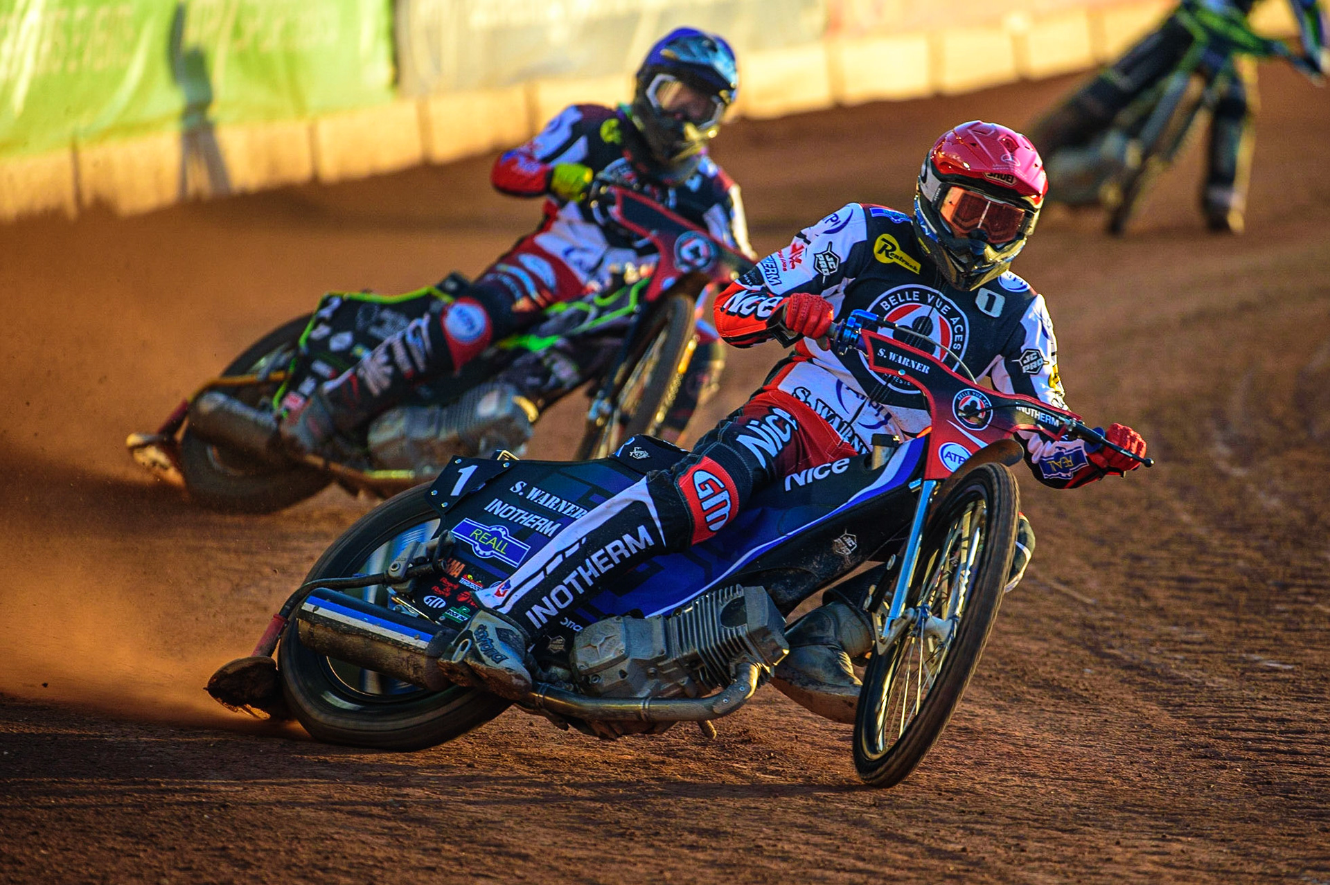Matej Zagar  (Red) leads team mate Tom Brennan  (Blue)  during the SGB Premiership match between Belle Vue Aces and Ipswich Witches at the National Speedway Stadium, Manchester on Monday 8th August 2022. (Credit: Ian Charles | MI News)