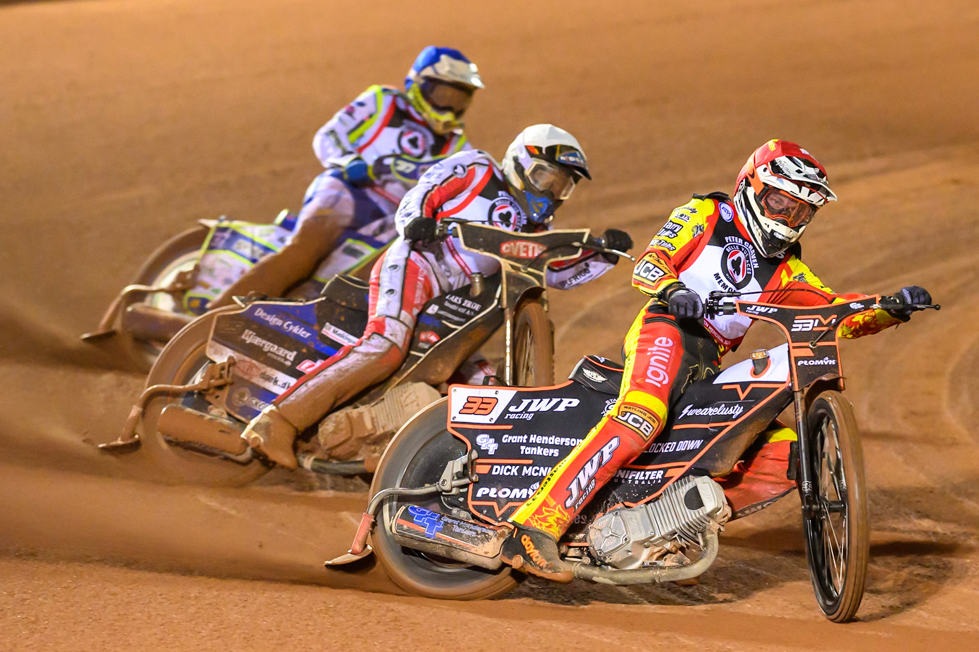 Sam Masters in Red leading Rasmus Jensen  in White and Chris Harris in Blue during the Peter Craven Memorial Trophy at the National Speedway Stadium, Manchester, on Monday 16th March 2026. (Photo: Ian Charles | MI News)