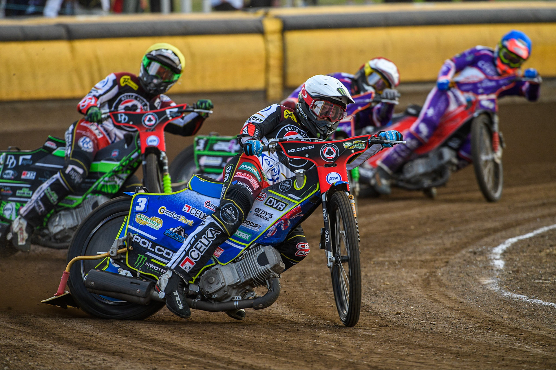 Jaimon Lidsey (White) and Charles Wright (Yellow) go for maximum points over Benjamin Basso (Red) and Richie Worrall (Blue) during the Sports Insure Premiership match between Peterborough and Belle Vue Aces at East of England Showground, Peterborough on Monday 26th June 2023. (Photo: Ian Charles | MI News)
