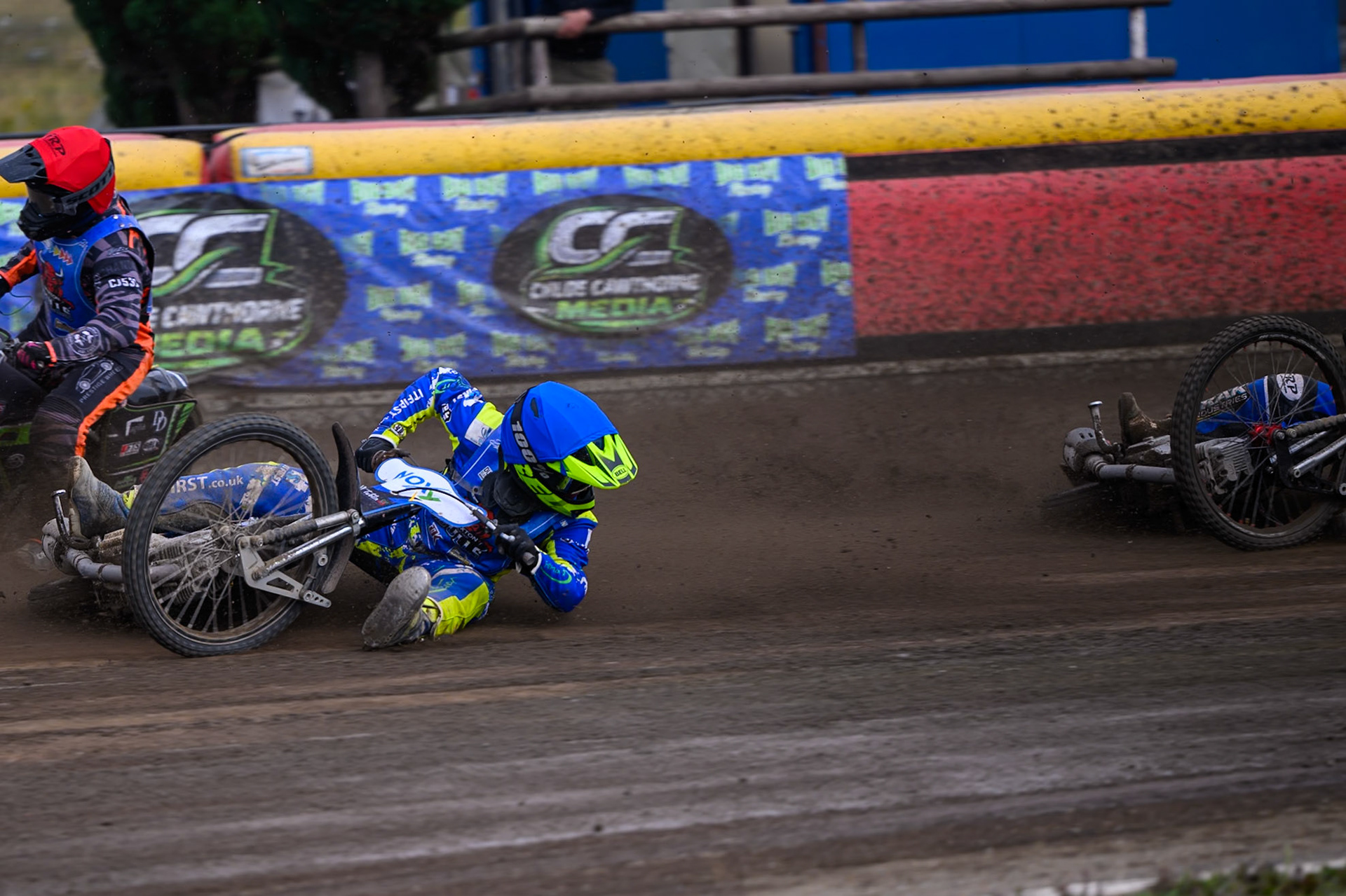 Will Boraston of Buxton Bulls in Yellow falls in the path of Ollie Binns of Kings Lynn Young Stars during the WSRA National Development League match between Buxton Bulls and King's Lynn Young Stars at Hi-Edge Speedway, Buxton on Sunday 9th August 2026. (Photo: Ian Charles | MI News)