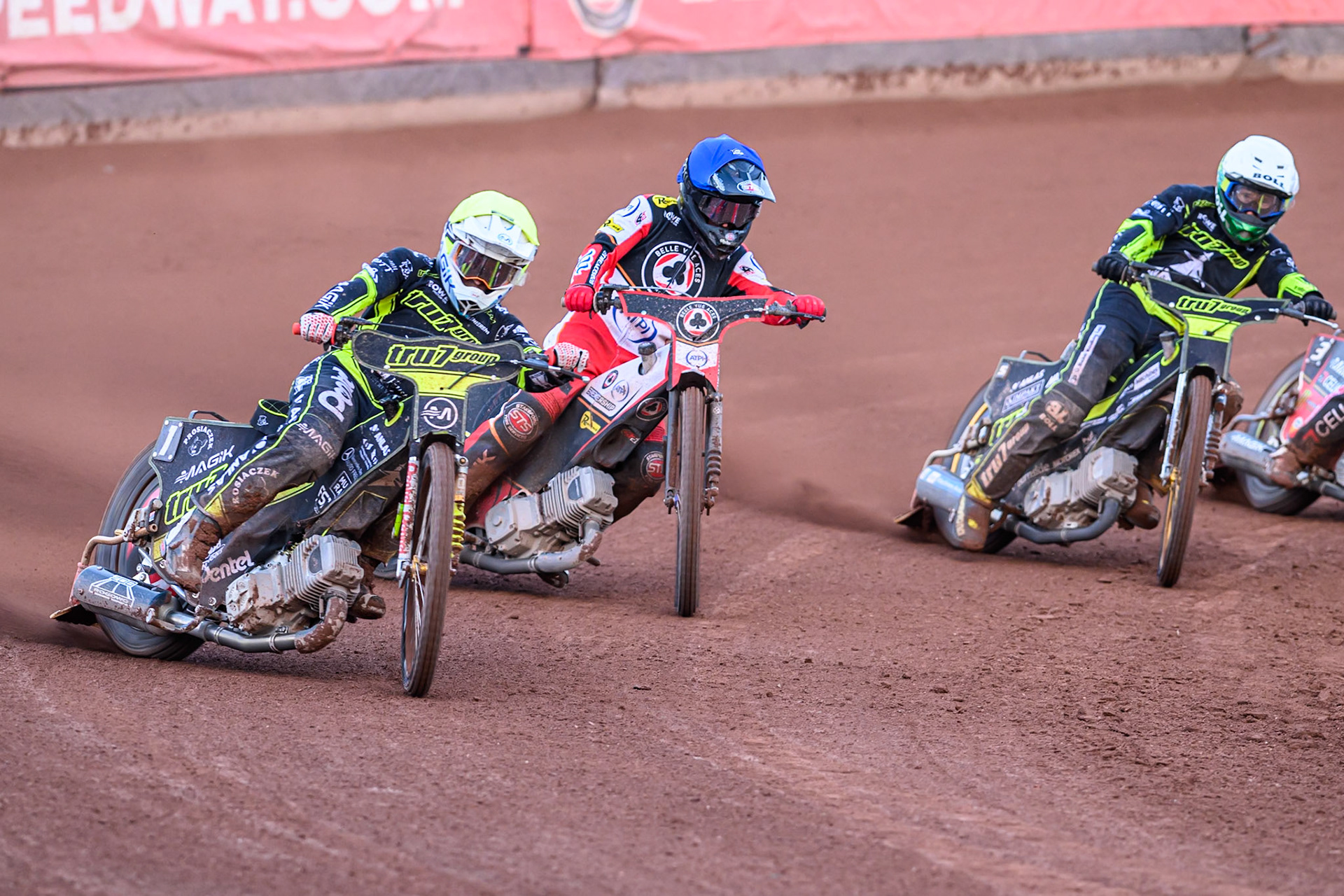 Ipswich Witches' Emil Saifutdinov in Yellow leading Belle Vue Aces' Zach Cook  in Blue and Ipswich Witches' Jason Doyle  in White during the Rowe Motor Oil Premiership match between Belle Vue Aces and Ipswich Witches at the National Speedway Stadium, Manchester on Monday 30th June 2025. (Photo: Ian Charles | MI News)