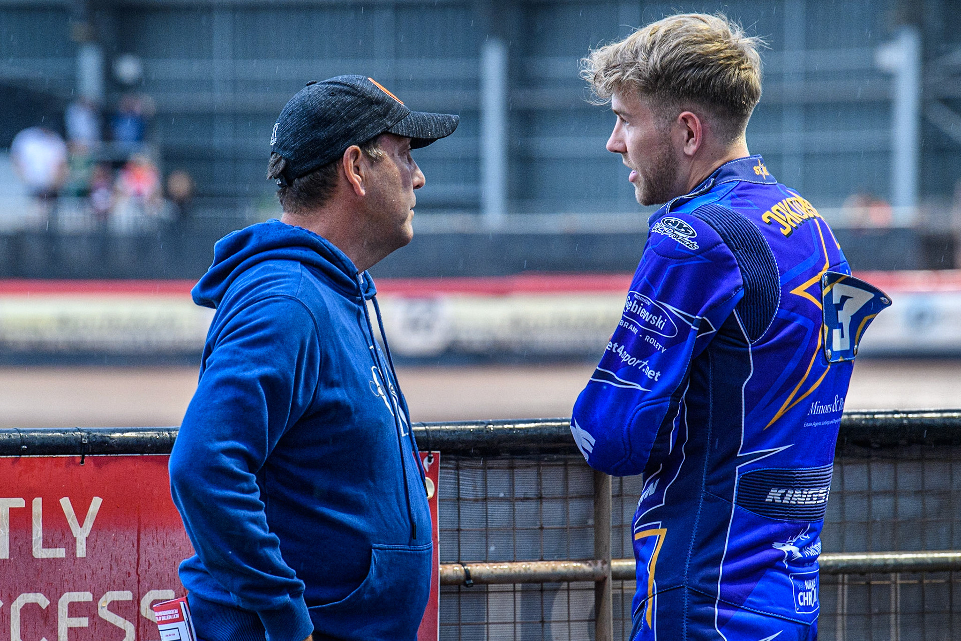King’s Lynn MacInnes Stars Team Manager Rob Lyon (left) chats with Team Captain Frederik Jakobsen during the Sports Insure Premiership match between Belle Vue Aces and King's Lynn Stars at the National Speedway Stadium, Manchester on Monday 12th June 2023. (Photo: Ian Charles | MI News)