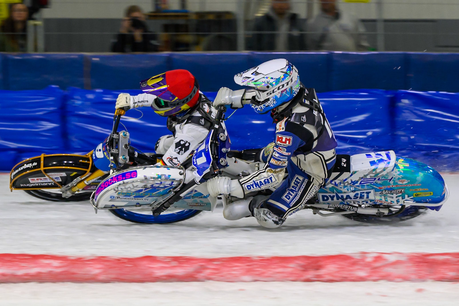 Max Koivula (11) of Finland in White rides inside Max Niedermaier (9) of Germany  in Red during the FIM Ice Speedway Of Nations at Ice Rink Thialf, Heerenveen on Sunday 12th April 2026. (Photo: Ian Charles | MI News)