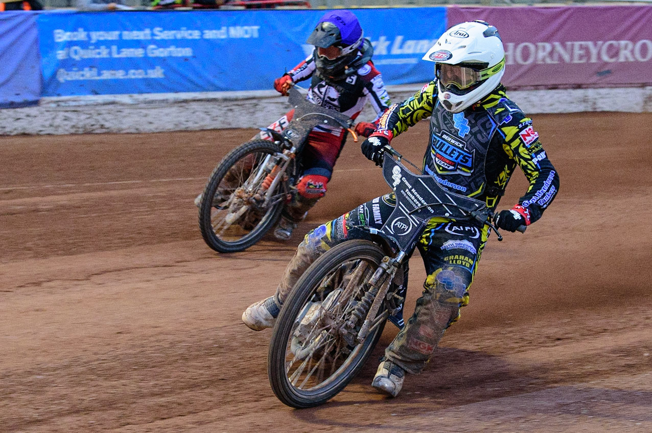 MANCHESTER, UK. JUN 24TH  Kyle Bickley  (White) inside Jack Smith  (Blue) during the National Development League match between Belle Vue Colts and Berwick Bullets at the National Speedway Stadium, Manchester on Friday 24th June 2022. (Credit: Ian Charles | MI News)