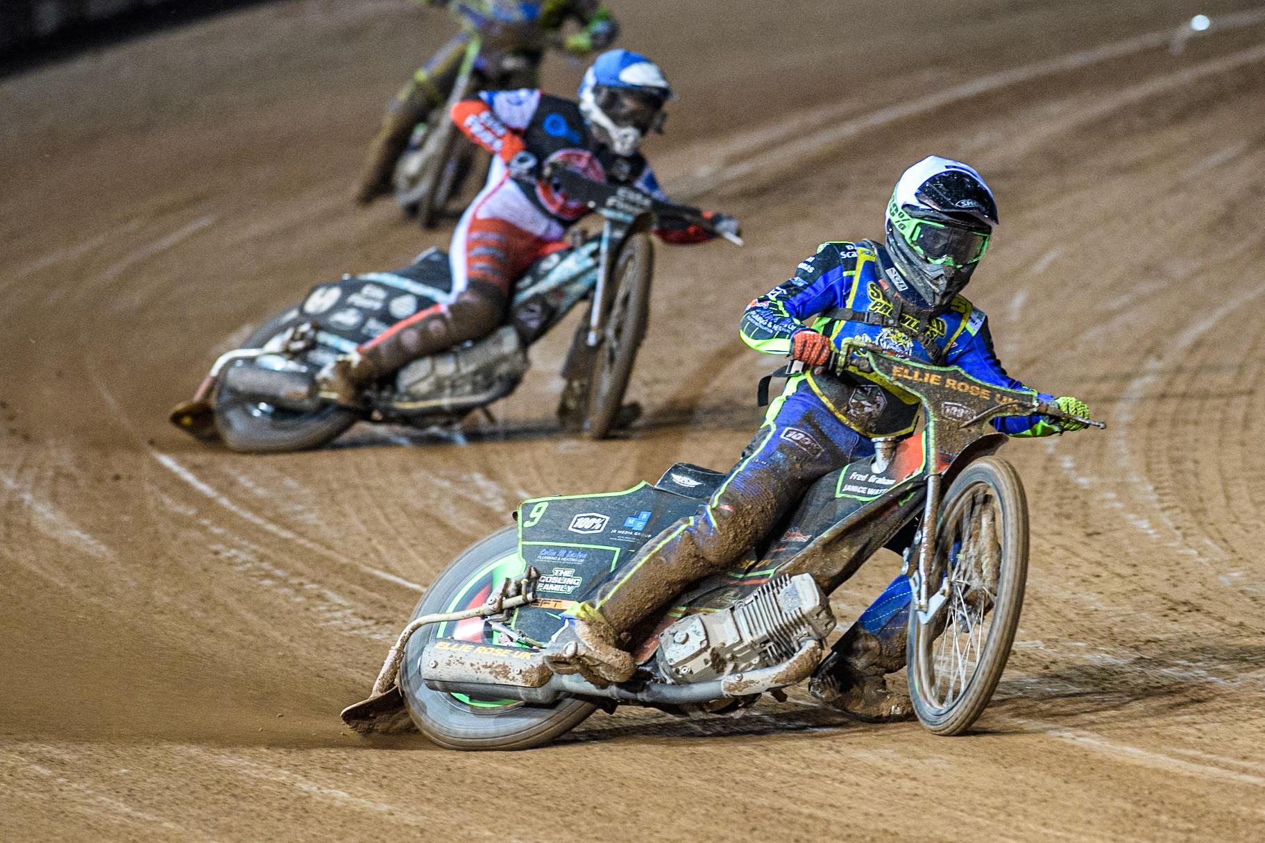 Sheffield Cubs' Luke Harrison in White leading Belle Vue Colts' Chad Wirtzfeld in Blue during the WSRA National Development League match between Belle Vue Colts and Sheffield Tiger Cubs at the National Speedway Stadium, Manchester on Monday 7th October 2024. (Photo: Ian Charles | MI News)