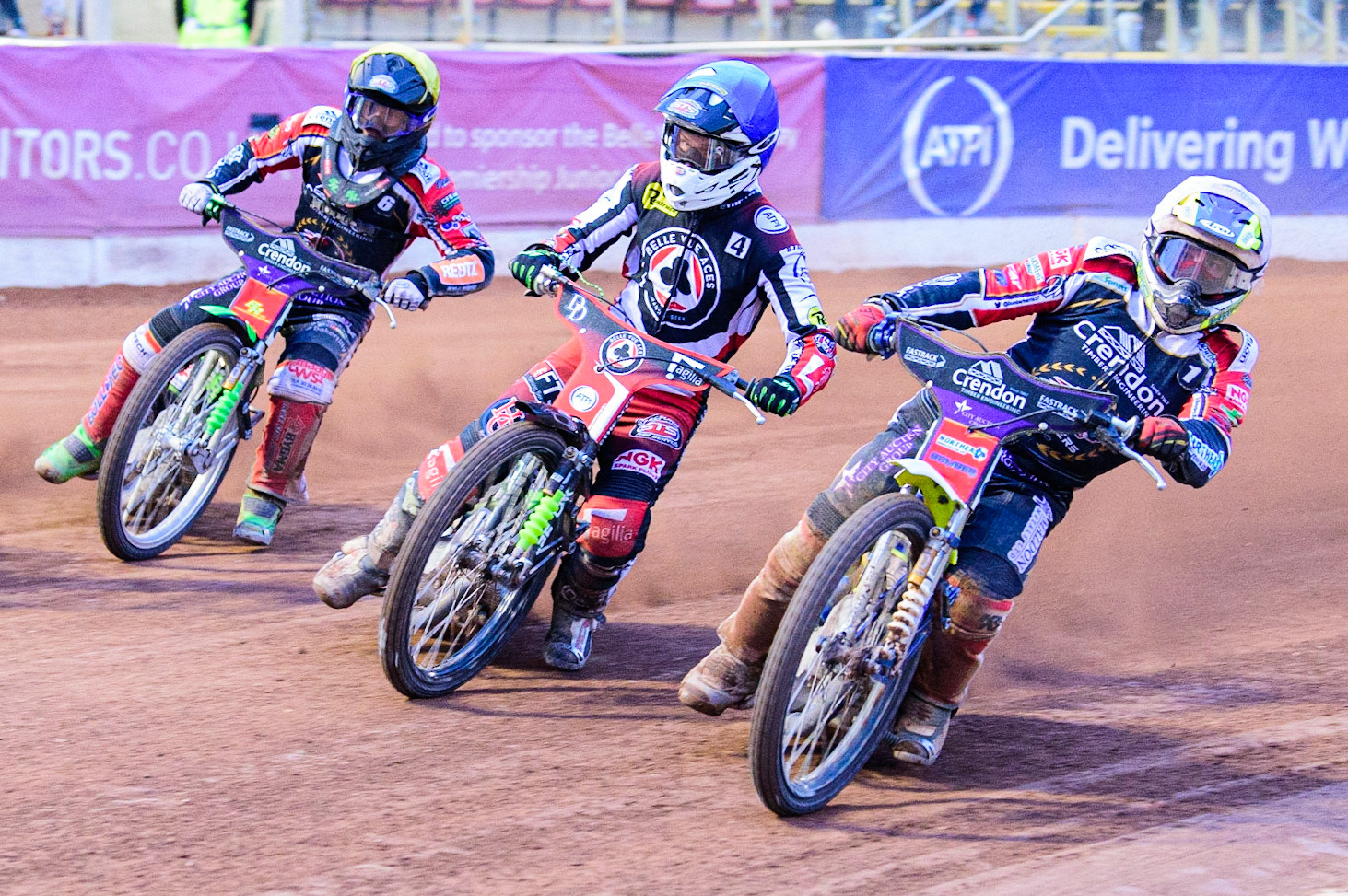 Chris Harris  (White) inside Charles Wright (Blue) and Benjamin Basso (Yellow) during the SGB Premiership match between Belle Vue Aces and Peterborough at the National Speedway Stadium, Manchester on Monday 25th July 2022. (Credit: Ian Charles | MI News