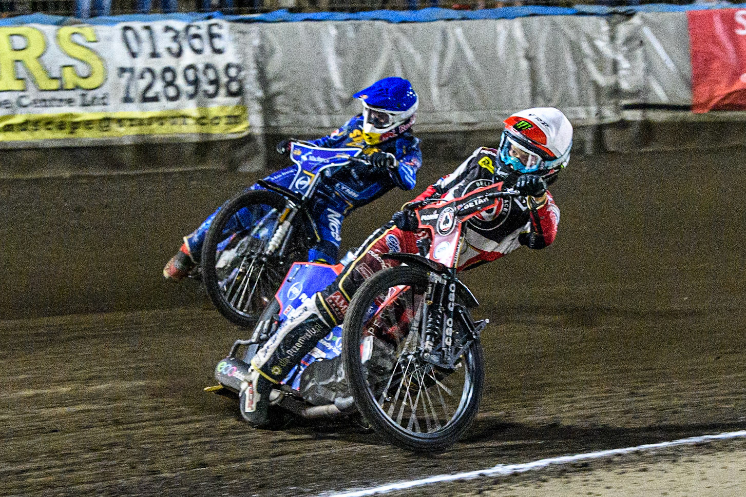 Charles Wright (White) leads  Simon Lambert (Blue) during the Sports Insure Premiership match between King's Lynn Stars and Belle Vue Aces at the Adrian Flux Arena, King's Lynn on Thursday 24th August 2023. (Photo: Ian Charles | MI News)