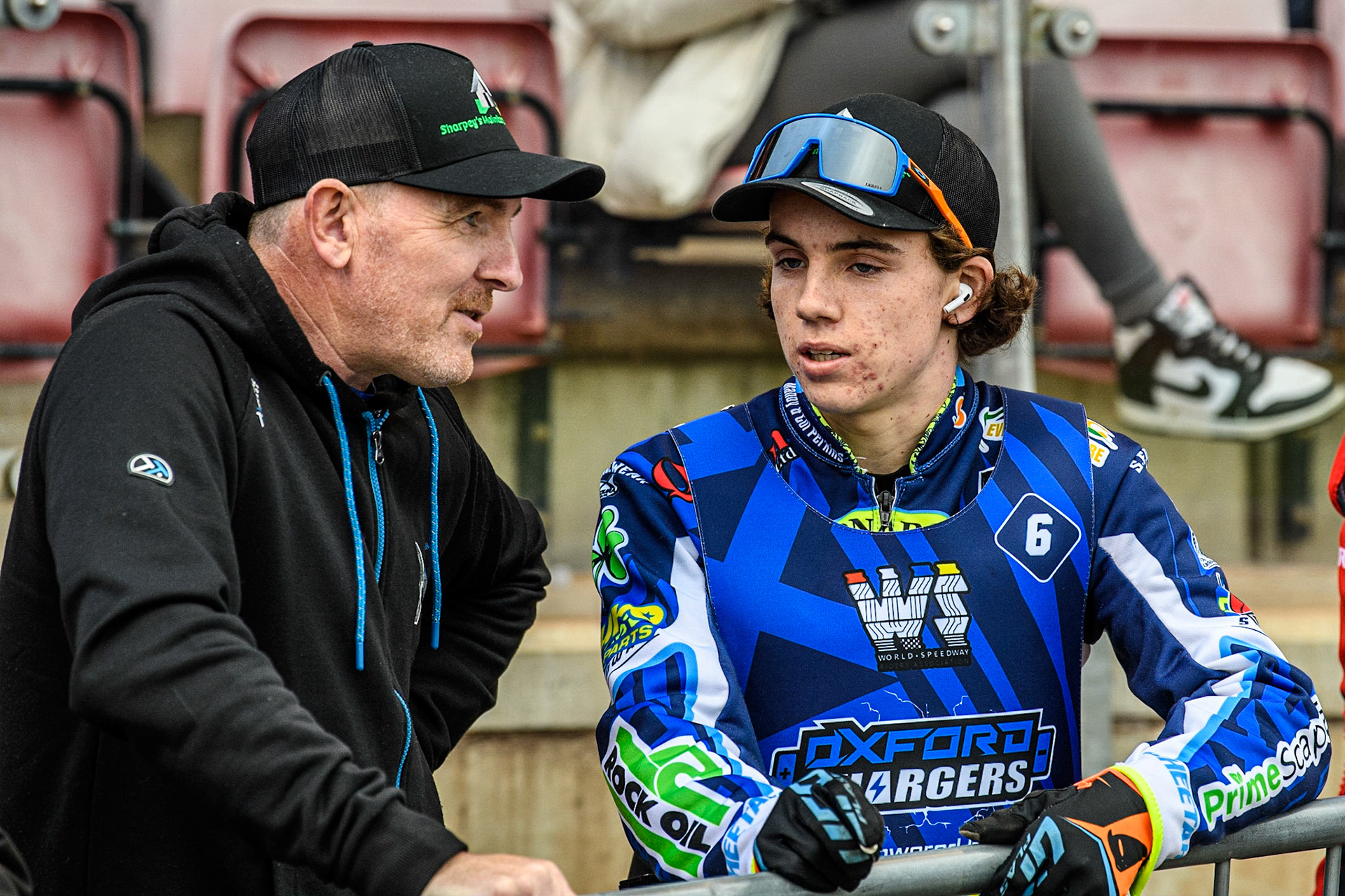 Luke Killeen  (right) chats with his mechanic Paul Sharples during the National Development League match between Belle Vue Aces and Oxford Chargers at the National Speedway Stadium, Manchester on Friday 12th May 2023. (Photo: Ian Charles | MI News)