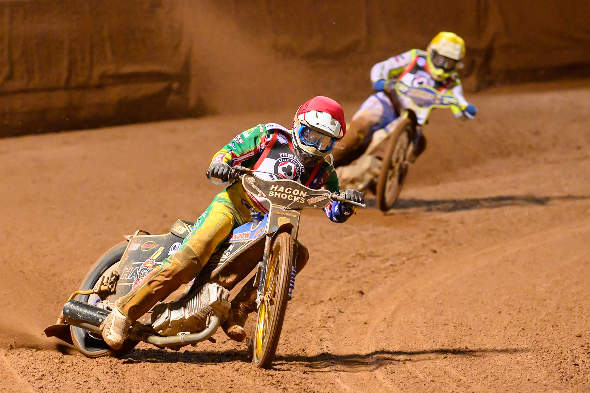 Jason Doyle  in Red leading Chris Harris in Yellow during the Peter Craven Memorial Trophy at the National Speedway Stadium, Manchester, on Monday 16th March 2026. (Photo: Ian Charles | MI News)
