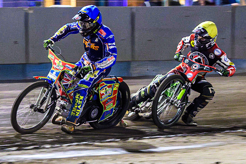 Simon Lambert  (Blue) leads  Charles Wright (Yellow) during the Sports Insure Premiership match between King's Lynn Stars and Belle Vue Aces at the Adrian Flux Arena, King's Lynn on Thursday 24th August 2023. (Photo: Ian Charles | MI News)