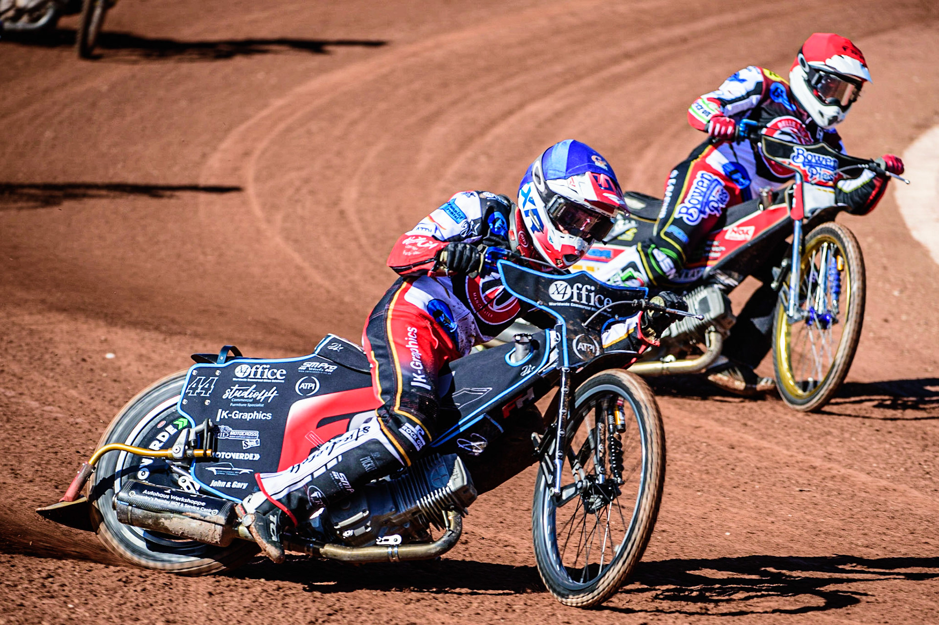 Freddy Hodder   (Blue) leads team mate Paul Bowen   (Red) as the Colts go for maximum points during the National Development League match between Belle Vue Colts and Berwick Bullets at the National Speedway Stadium, Manchester on Friday 7th April 2023. (Photo: Ian Charles | MI News)