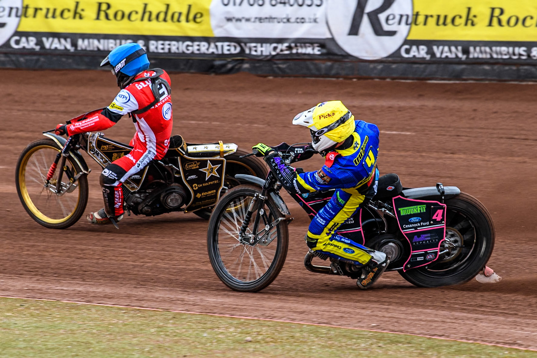 Sheffield Tigers' Josh Pickering (Yellow) chases Belle Vue ATPI Aces Norick Blodorn (Blue) during the Rowe Motor Oil Premiership KO Cup Quarter Final 1st Leg between Belle Vue Aces and Sheffield Tigers at the National Speedway Stadium, Manchester on Monday 1st April 2024. (Photo: Ian Charles | MI News)