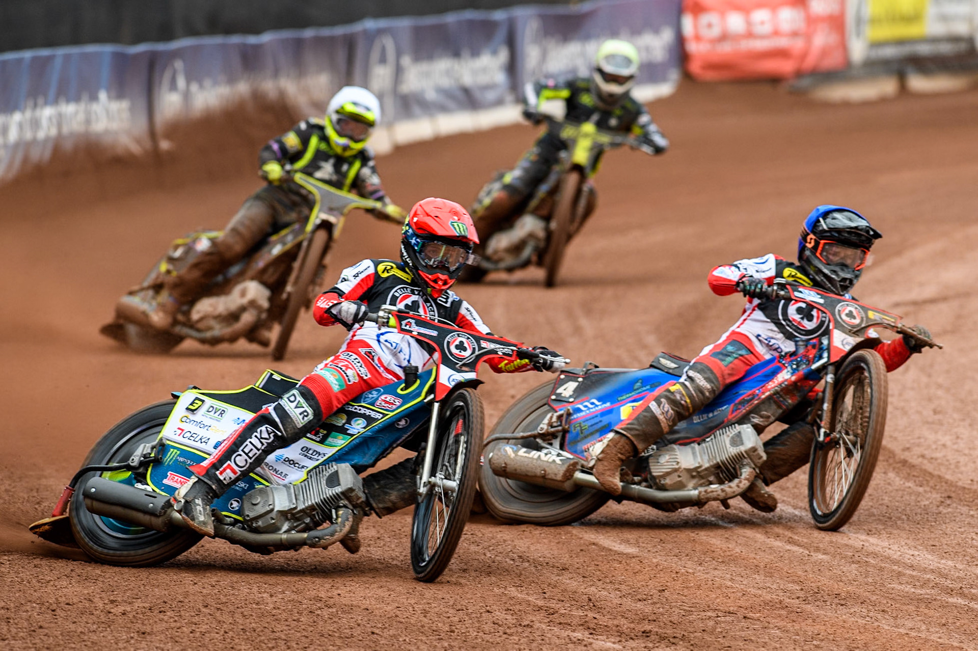 Belle Vue Aces' Jaimon Lidsey  in Red leading Belle Vue Aces' Ben Cook  in Blue, Ipswich Witches' Guest Rider Tom Brennan  in White and Ipswich Witches' Dan Thompson in Yellow during the Rowe Motor Oil Premiership match between Belle Vue Aces and Ipswich Witches at the National Speedway Stadium, Manchester on Monday 1st July 2024. (Photo: Ian Charles | MI News)
