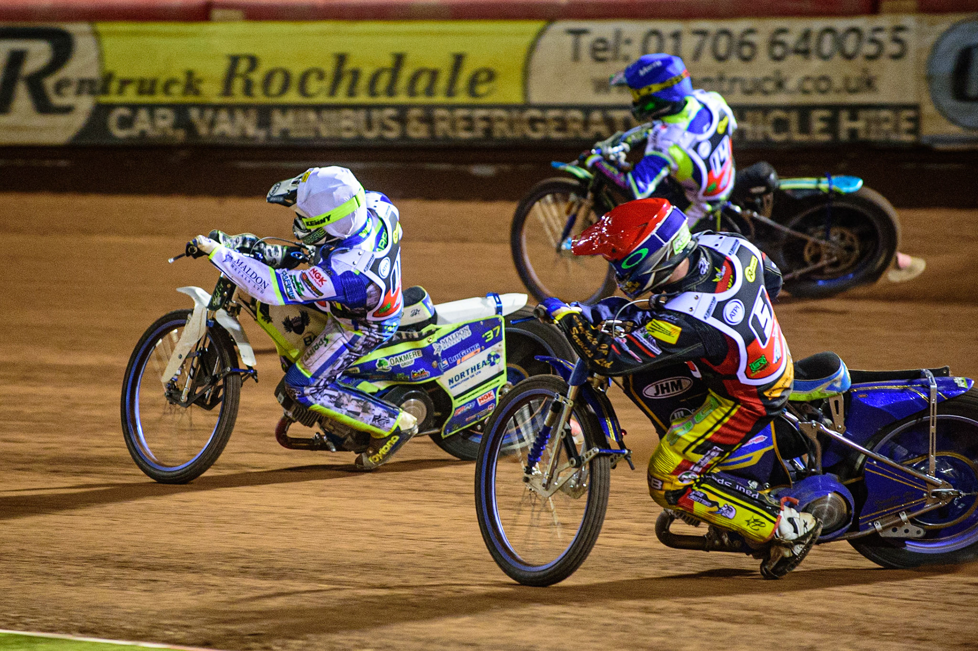MANCHESTER, UK. OCT 23RD  Chris Harris (White) passes Kyle Howarth (Red)  and Nick Morris  (Blue) during the Peter Craven Memorial Trophy event at the National Speedway Stadium, Manchester on Saturday 23rd October 2021. (Credit: Ian Charles | MI News)