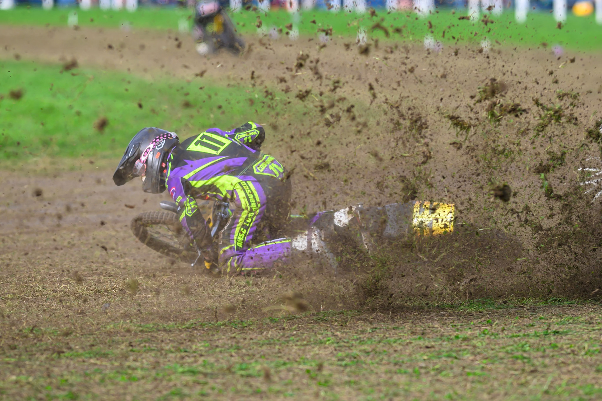 British Masters (Solos): Paul Cooper (11)  comes to grief on the loose area of the track during the British Masters Grasstrack Championship at Lower Marsh Farm, Much Hoole, Preston in Lancashire, England on Sunday 13th September 2026. (Photo: Ian Charles | MI News)