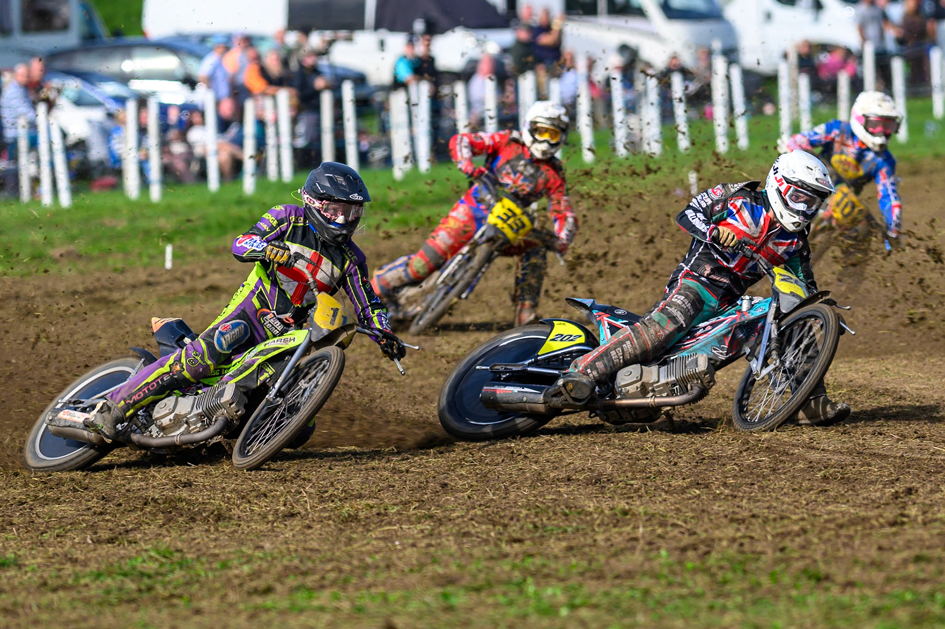 British Masters (Solos): Alfie Bowtell (202) rides inside Paul Cooper (11)  with Tony Atkin (10)  and Charlie Wood (33)  behind during the British Masters Grasstrack Championship at Lower Marsh Farm, Much Hoole, Preston in Lancashire, England on Sunday 13th September 2026. (Photo: Ian Charles | MI News)