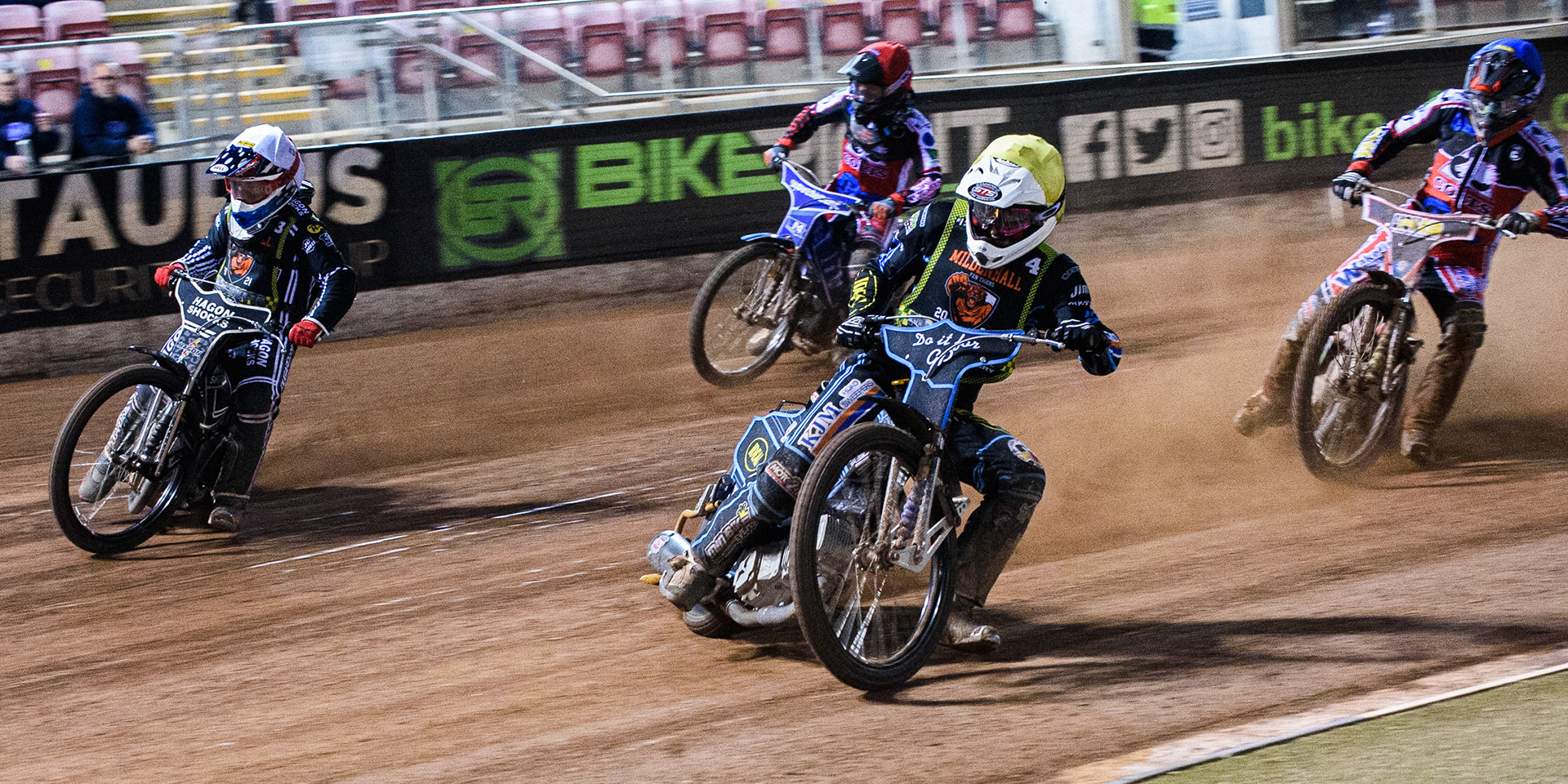 MANCHESTER, SEPT 3RD. Luke Ruddick  (Yellow) and Sam Hagon  (White) lead Paul Bowen (Blue) and Harry McGurk  (Red) during the National Development League match between Belle Vue Aces and Mildenhall Fens Tigers at the National Speedway Stadium, Manchester on Friday 3rd September 2021. (Credit: Ian Charles | MI News)