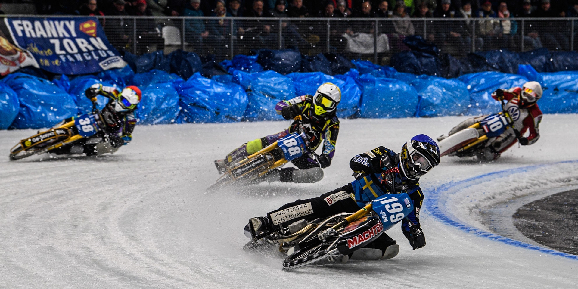 Martin Haarahiltunen (199) of Sweden in Blue leading Maximilian Niedermaier (38) of Germany in Red, Max Niedermaier  (88) of Germany in Yellow and Reserve Josef Kreuzberger (18) of Austria in White during the Ice Speedway Gladiators World Championship Final 2 at Max-Aicher-Arena, Inzell on Sunday 16th March 2025. (Photo: Ian Charles | MI News)