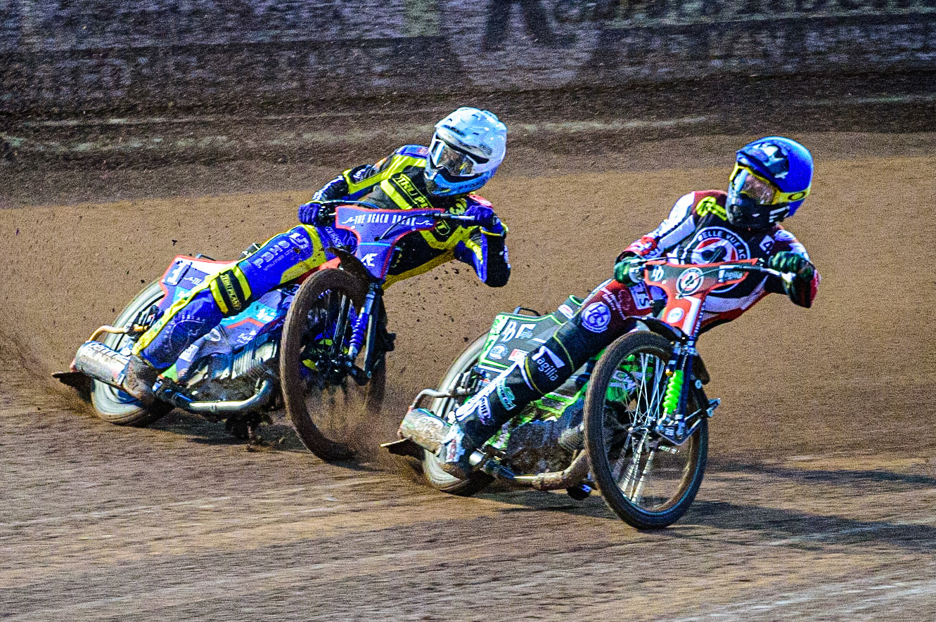 Charles Wright  (Blue) inside Adam Ellis  (White) during the SGB Premiership match between Belle Vue Aces and Sheffield Tigers at the National Speedway Stadium, Manchester on Monday 27th March 2023. (Photo: Ian Charles | MI News)
