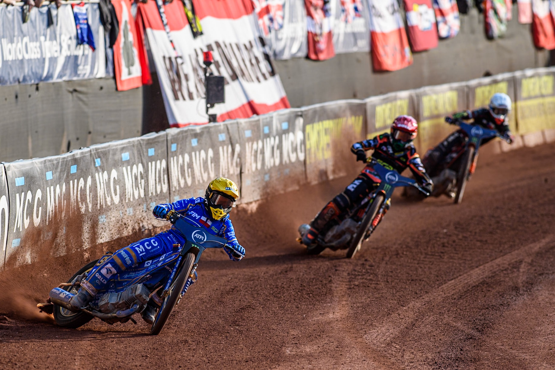 Bartosz Zmarzlik (95) of Poland in Yellow leading Mikkel Michelsen (155) of Denmark in Red and January Kvech (201) of Czech Republic in White during the ATPI FIM Speedway Grand Prix Round 5 at the National Speedway Stadium, Manchester, on Saturday 14th June 2025. (Photo: Ian Charles | MI News)