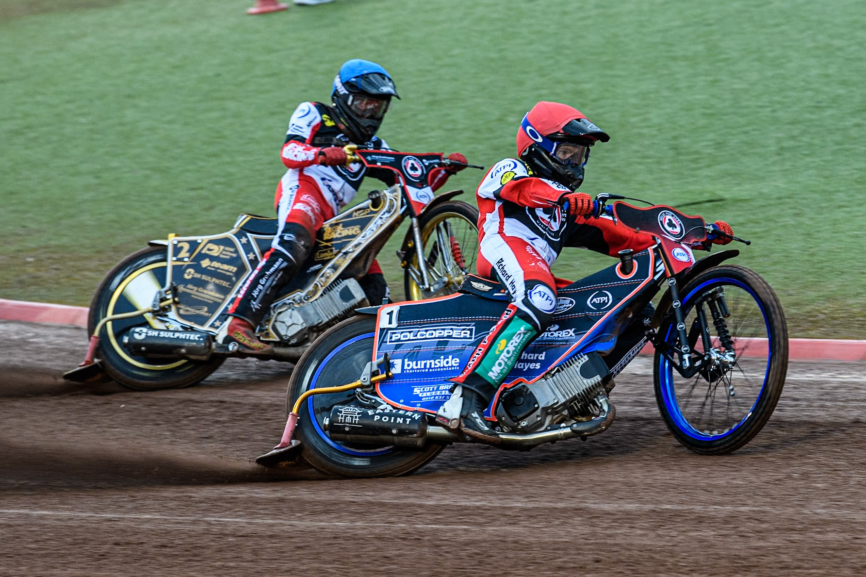 Belle Vue Aces' Brady Kurtz in Red leading team mate Belle Vue Aces' Norick Blödorn in Blue during the Rowe Motor Oil Premiership match between Belle Vue Aces and Ipswich Witches at the National Speedway Stadium, Manchester on Monday 22nd April 2024. (Photo: Ian Charles | MI News)