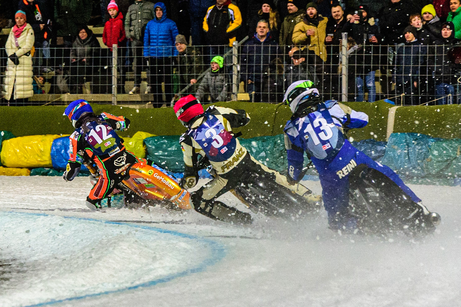 Reinhard Greisel (White) chases Franz Mayerbüchler (Red) and Markus Jell (Blue) during the German Individual Ice Speedway Championship at Horst-Dohm-Eisstadion, Berlin on Friday 3rd March 2023. (Photo: Ian Charles | MI News)