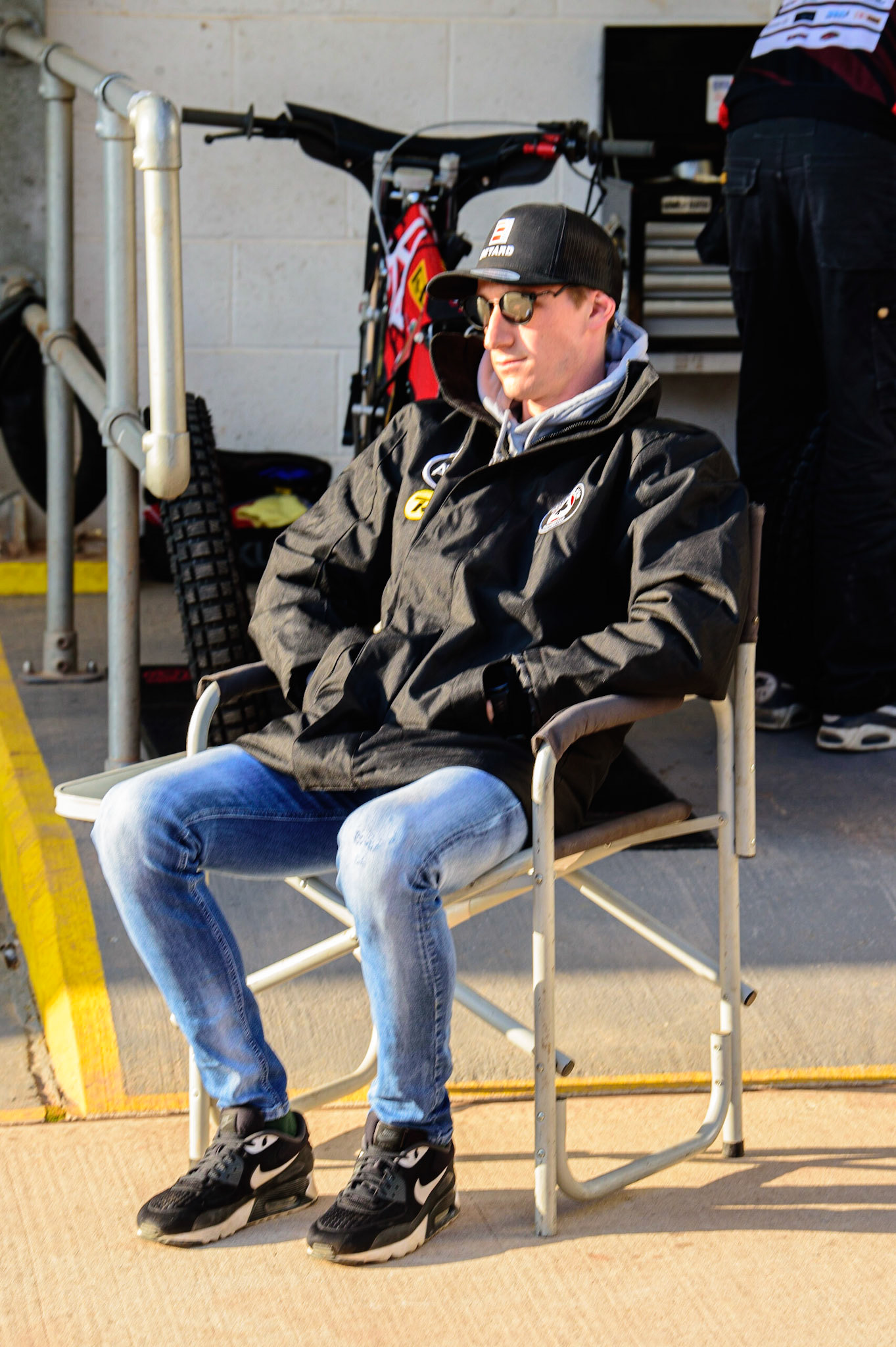 MANCHESTER, UK.  MAR 28TH.  Max Fricke of Belle Vue relaxes in the sun prior to the SGB Premiership League Cup match between Belle Vue Aces and Sheffield Tigers at the National Speedway Stadium, Manchester on Monday 28th March 2022. (Credit: Ian Charles | MI News)