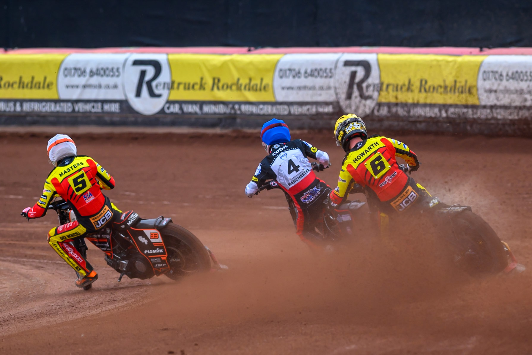 Sam Masters of Leicester Lions in White rides inside Zach Cook of Belle Vue Aces in Blue and Kyle Howarth of Leicester Lions in Yellow during the Rowe Motor Oil Premiership match between Belle Vue Aces and Leicester Lions at the National Speedway Stadium, Manchester on Monday 15th June 2026. (Photo: Ian Charles | MI News)