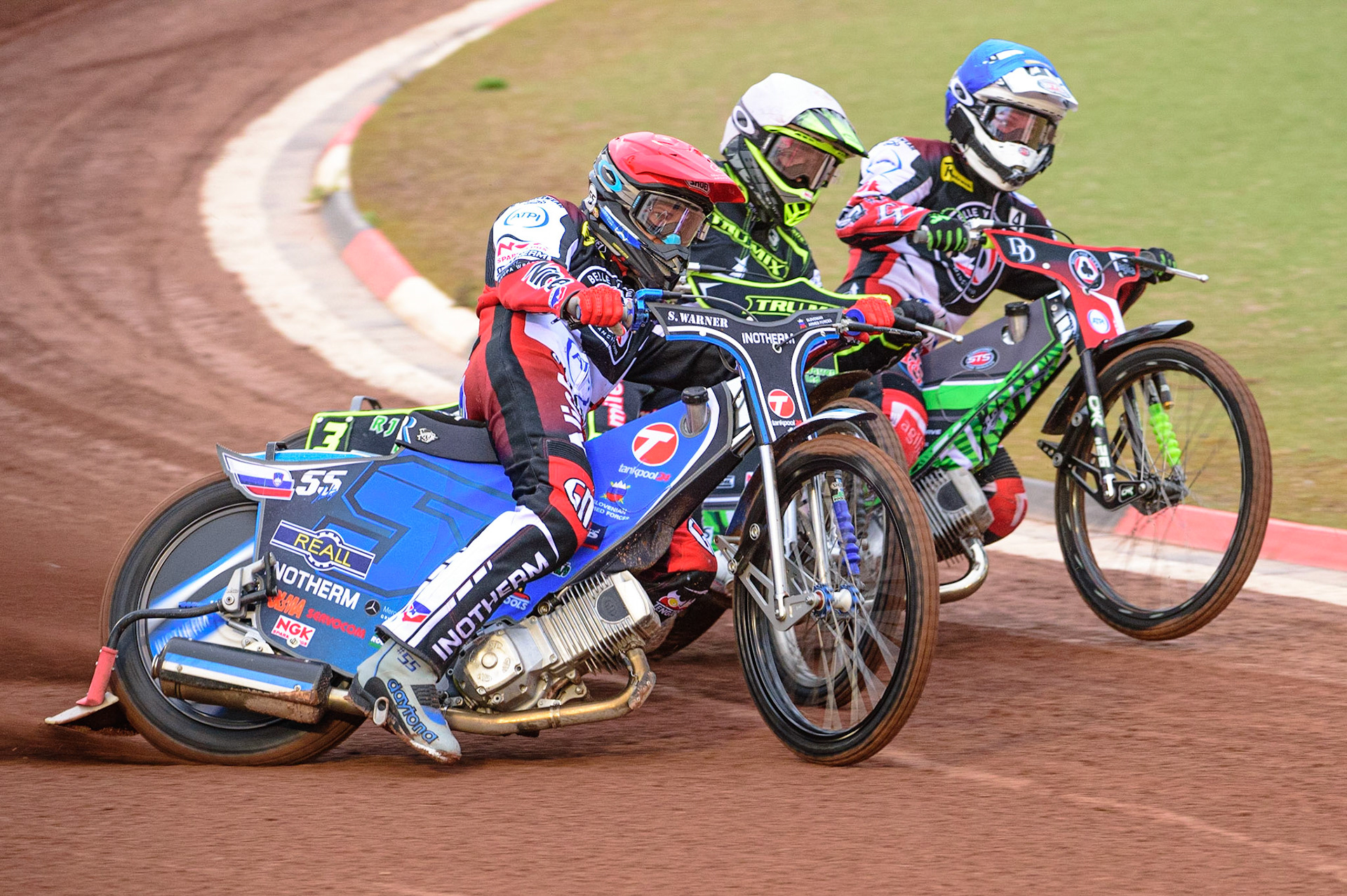 MANCHESTER, UK. JUN 6TH  Matej Žagar  (Red) outside Danny King  (White) and Charles Wright  (Blue) during the SGB Premiership match between Belle Vue Aces and Ipswich Witches at the National Speedway Stadium, Manchester on Monday 6th June 2022. (Credit: Ian Charles | MI News)