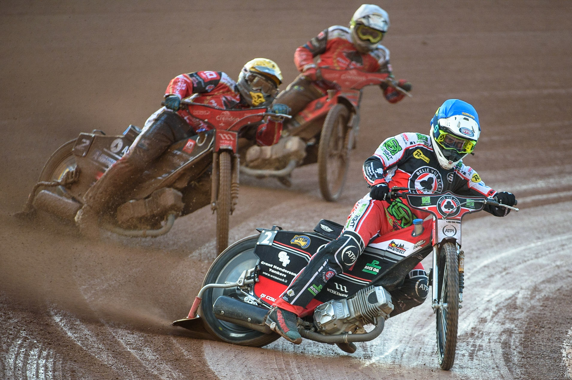 MANCHESTER, UK. AUG 9TH  Richie Worrall  (Blue) leads Bjarne Pedersen  (Yellow) and Chris Harris  (White) during the SGB Premiership match between Belle Vue Aces and Peterborough at the National Speedway Stadium, Manchester on Monday 9th August 2021. (Credit: Ian Charles | MI News)