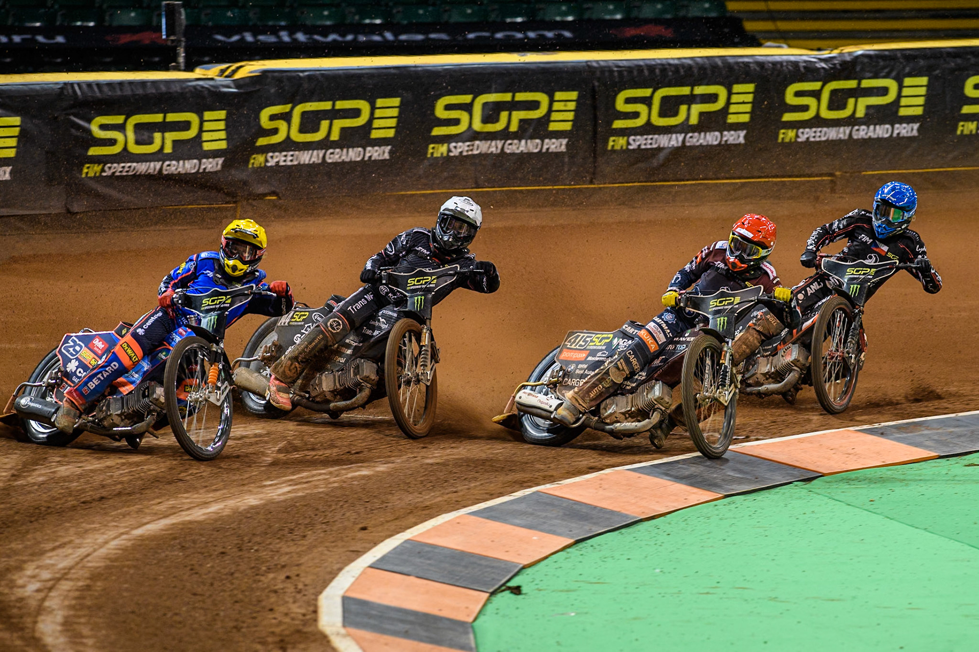 (L to R) Andzejs Lebedevs (29) of Latvia in Yellow Kai Huckenbeck (744) of Germany in White, Dominik Kubera (415) of Poland in Red and January Kvech (201) of Czechia in Blue during the FIM Speedway Grand Prix of Great Britain at The Principality Stadium, Cardiff on Saturday 17th August 2024. (Photo: Ian Charles | MI News)