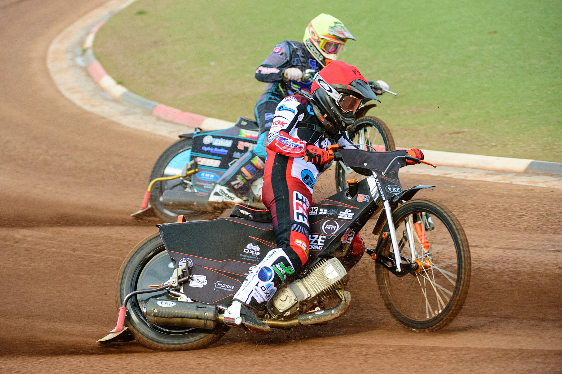 MANCHESTER, UK. JUN 24TH  Jack Smith (Red) outside Mason Watson  (Yellow) during the National Development League match between Belle Vue Colts and Berwick Bullets at the National Speedway Stadium, Manchester on Friday 24th June 2022. (Credit: Ian Charles | MI News)
