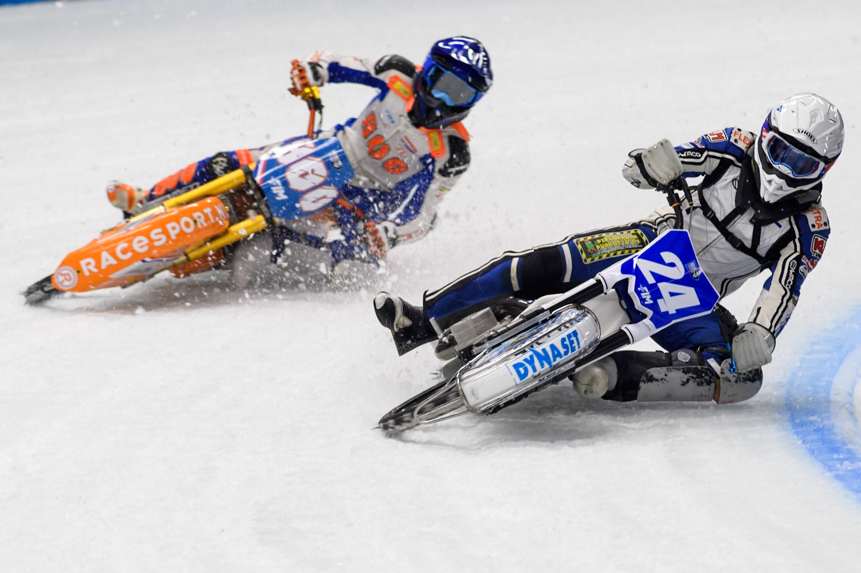 Max Koivula (24) of Finland in White rides inside Jasper Iwema (800) of The Netherlands in Blue during the Ice Speedway Gladiators World Championship Final 1 at Max-Aicher-Arena, Inzell on Saturday 15th March 2025. (Photo: Ian Charles | MI News)