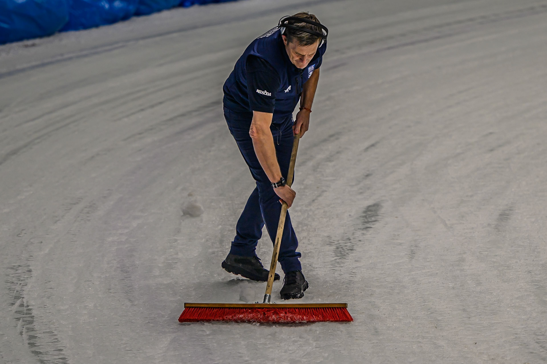 Race Director Phil Morris does some brushing of the ice on the track during the Ice Speedway Gladiators World Championship Final 1 at Max-Aicher-Arena, Inzell on Saturday 14th March 2026. (Photo: Ian Charles | MI News)