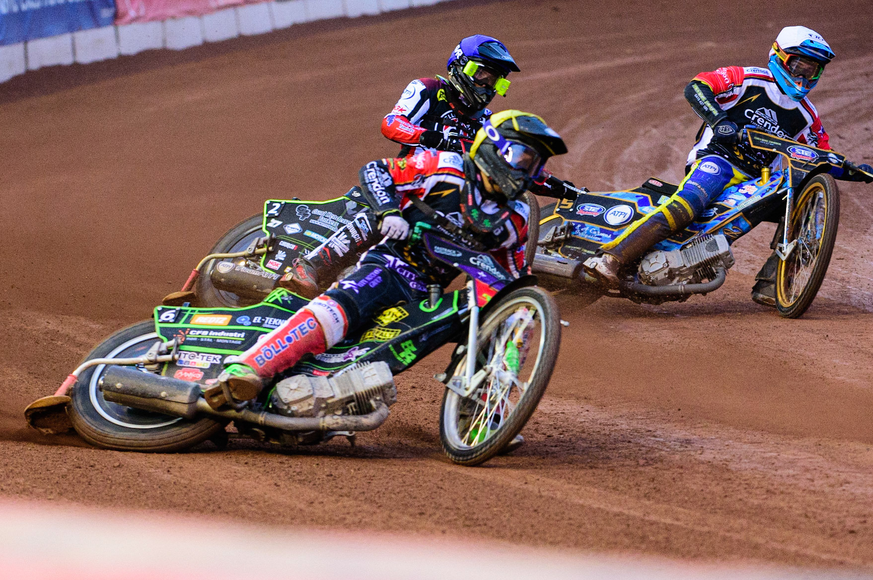 Benjamin Basso  (Yellow) outside Tom Brennan (Blue) and Justin Sedgmen  (White) during the SGB Premiership match between Belle Vue Aces and Peterborough at the National Speedway Stadium, Manchester on Monday 25th July 2022. (Credit: Ian Charles | MI News