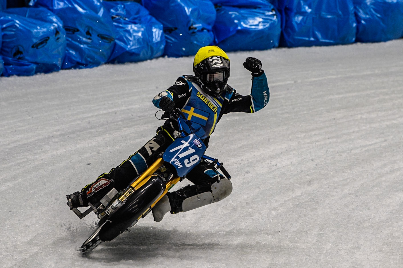 Filip Jäger (719) of Sweden celebrates his win in Heat 18 during the Ice Speedway Gladiators World Championship Final 2 at Max-Aicher-Arena, Inzell on Sunday 16th March 2025. (Photo: Ian Charles | MI News)