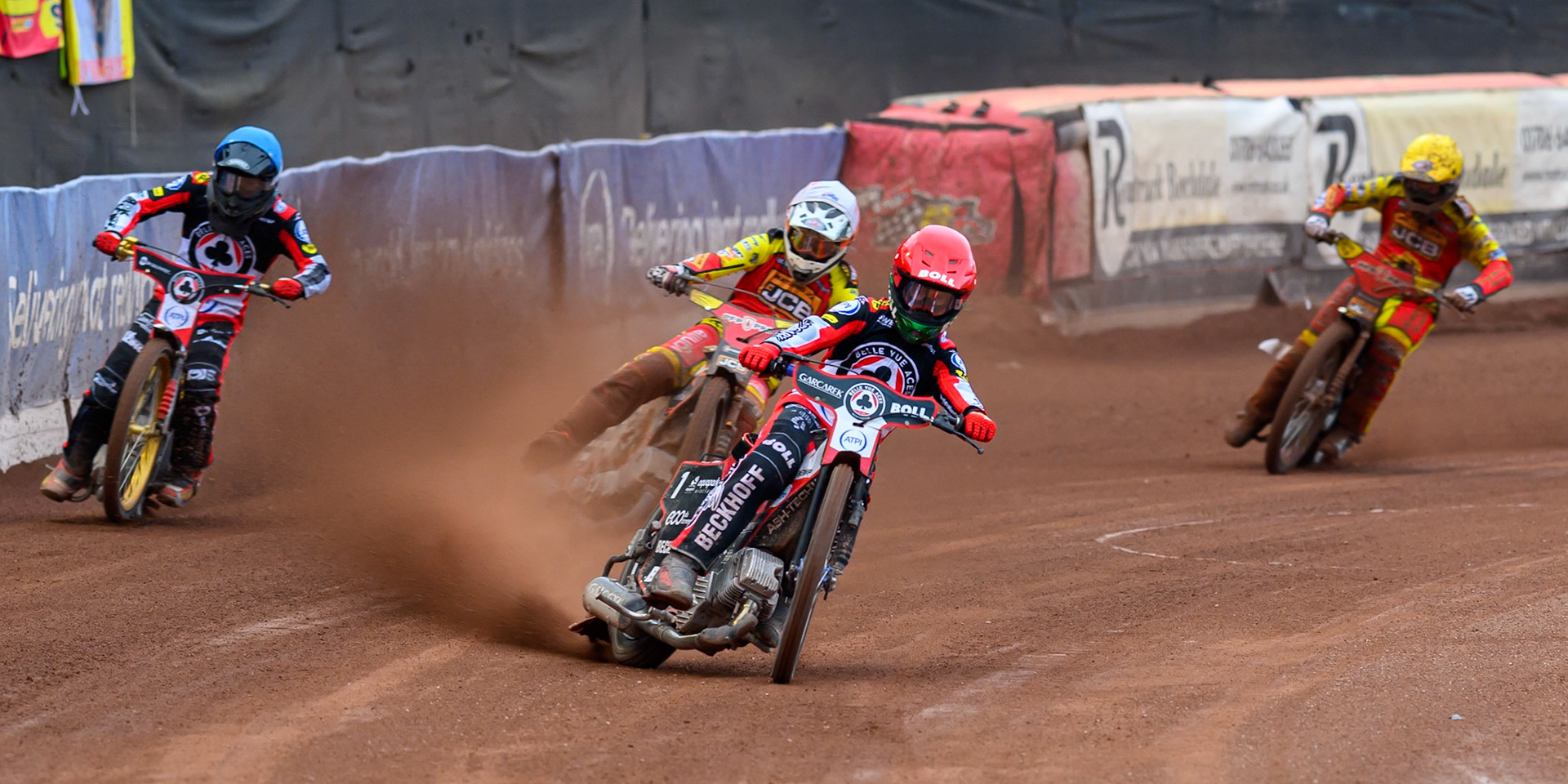 Brady Kurtz of Belle Vue Aces in Red leading Norick Blödorn of Belle Vue Aces in Blue, Sam Masters of Leicester Lions in White and Kyle Howarth of Leicester Lions in Yellow during the Rowe Motor Oil Premiership match between Belle Vue Aces and Leicester Lions at the National Speedway Stadium, Manchester on Monday 15th June 2026. (Photo: Ian Charles | MI News)