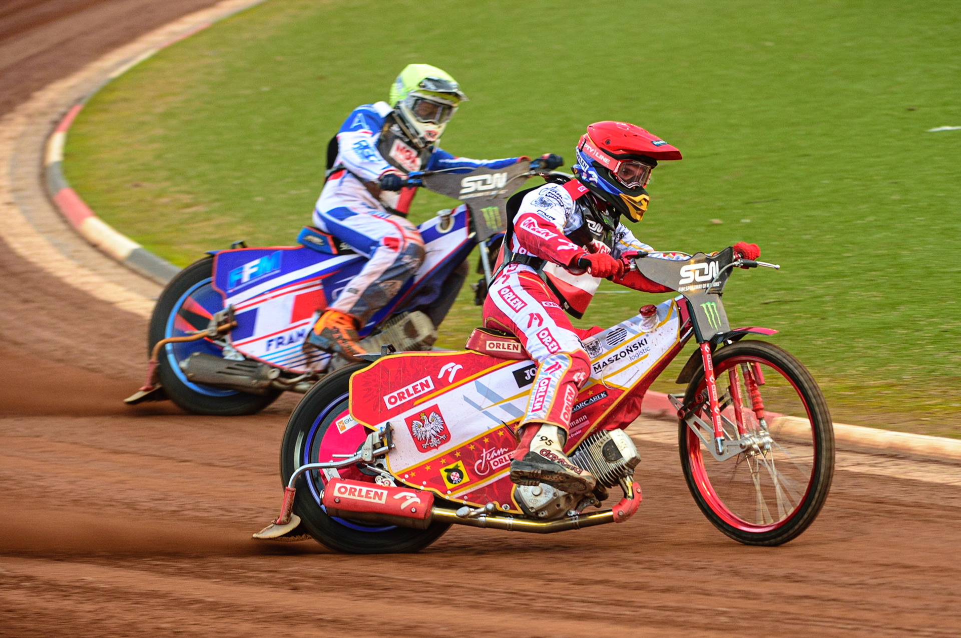 MANCHESTER, UK. OCT 16TH Bartosz Zmarzlik of Poland (Red)  outside Dmitri Berge of France (Yellow) during the Monster Energy FIM Speedway of Nations at the National Speedway Stadium, Manchester on Saturday  16th October 2021. (Credit: Ian Charles | MI News)