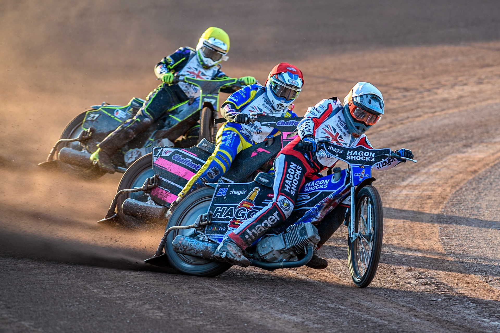 Jason Edwards in White leading Leon Flint in Red and Tom Brennan in Yellow during the Attis Insurance Sports Division British Final at the National Speedway Stadium, Manchester on Monday 12th May 2025. (Photo: Ian Charles | MI News)