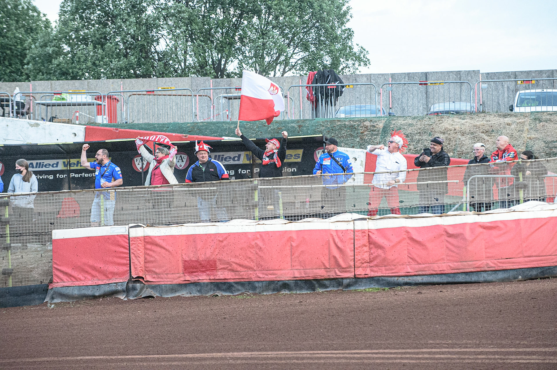 GLASGOW, UK. JUNE 19TH.  Polish fans cheer on Musielak as he leads his final heat during the FIM Speedway Grand Prix Qualifying Round at the Peugeot Ashfield Stadium, Glasgow on Saturday 19th June 2021. (Credit: Ian Charles | MI News)