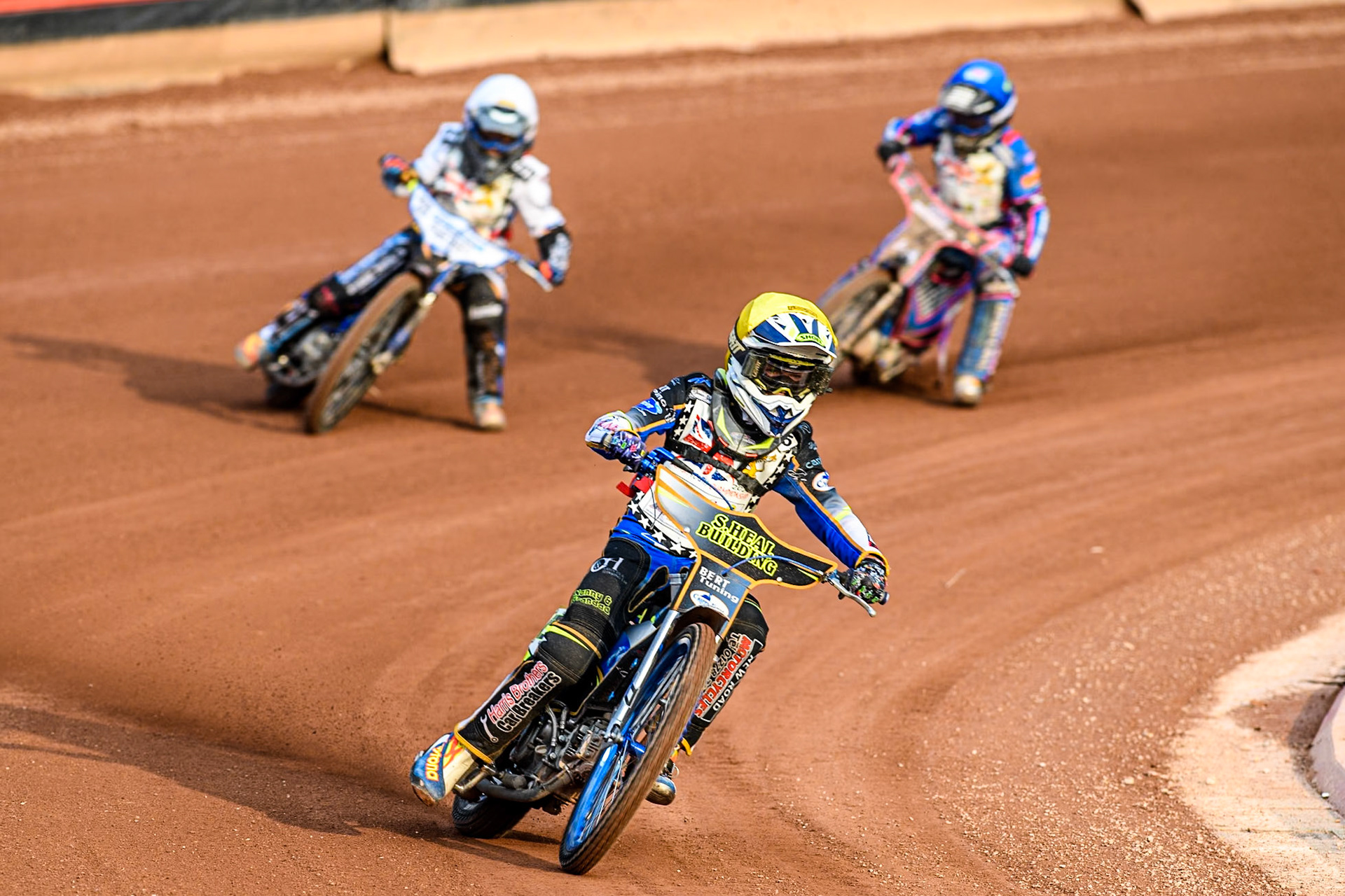 Oliver Bovingdon (125cc) in Yellow leading Reuben Marsh (125cc) in White and Rocco Webb (125cc) in Blue during the British Youth 250cc Championships at the National Speedway Stadium, Manchester on Friday 30th August 2024. (Photo: Ian Charles | MI News)