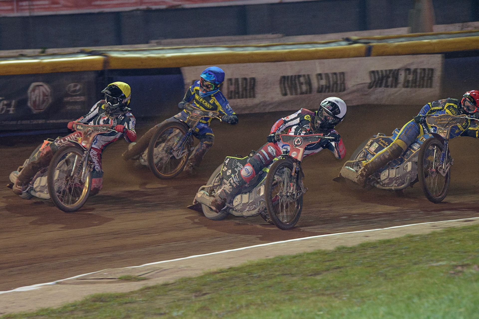 The decisive Heat 14 when Tom Brennan   (White) and Norick Blödorn (Yellow) lead Justin Sedgmen  (Blue) and Kyle Howarth  (Red) during the SGB Premiership Grand Final 2nd Leg between Sheffield Tigers and Belle Vue Aces at Owlerton Stadium, Sheffield on Thursday 13th October 2022. (Credit: Ian Charles | MI News)