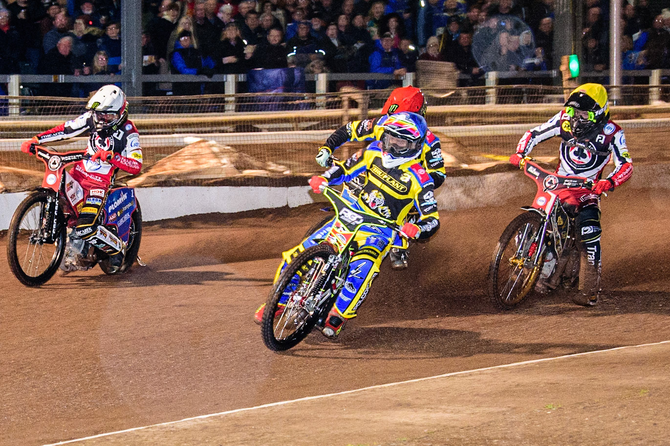 David Bellego  (Blue) leads Dan Bewley ] (White) Norick Blodorn  (Yellow) and Jack Holder  (Red) into the first turn during the Sheffield Tigers vs Belle Vue Aces meeting in the SGP Premiership at Owlerton Stadium, Sheffield on Thursday 23rd March 2023. (Photo: Ian Charles | MI News)