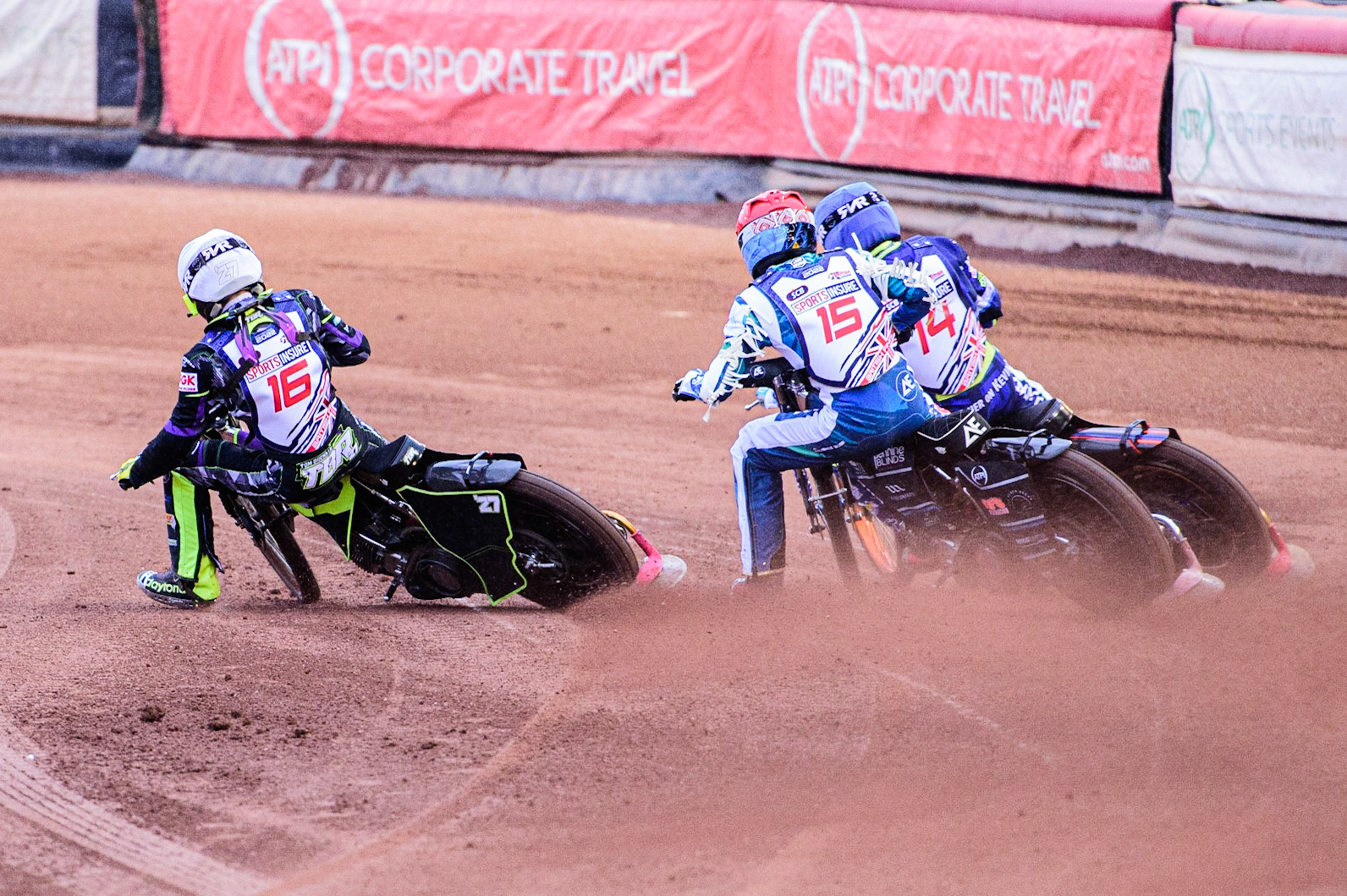 Tom Brennan (White) goes inside Adam Ellis  (Red) and Scott Nicholls (Blue) during the Sports Insure British Speedway Championship Final at the National Speedway Stadium, Bellevue, Manchester, England on Monday 1st August 2022. (Photo by: Ian Charles | MI News)