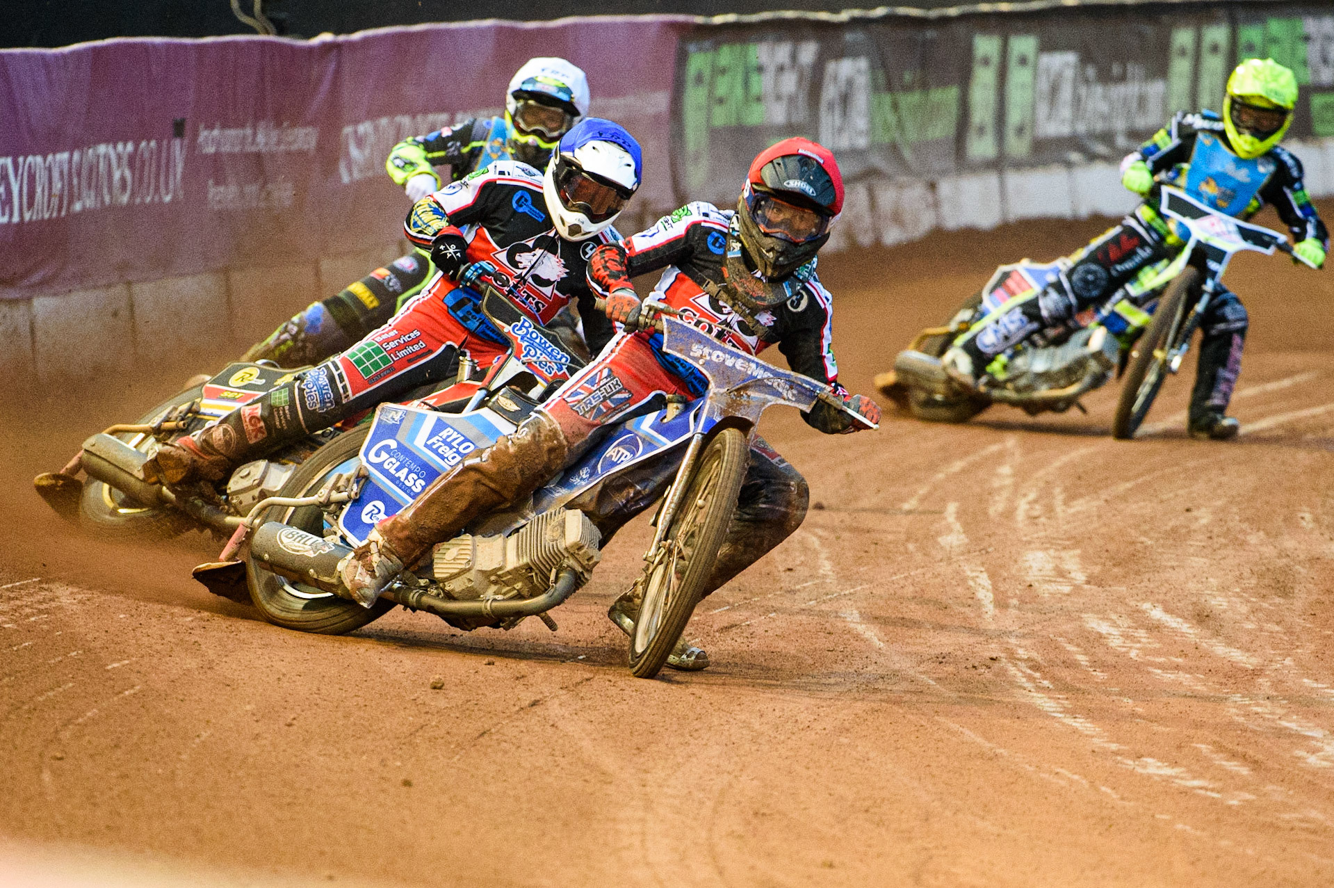 MANCHESTER, UK. AUGUST 20TH Harry McGurk  (Red) and Paul Bowen (Blue) lead Kyle Bickley  (White) and Gregor Millar  (Yellow) during the National Development League match between Belle Vue Aces and Armadale Devils at the National Speedway Stadium, Manchester on Friday 20th August 2021. (Credit: Ian Charles | MI News)