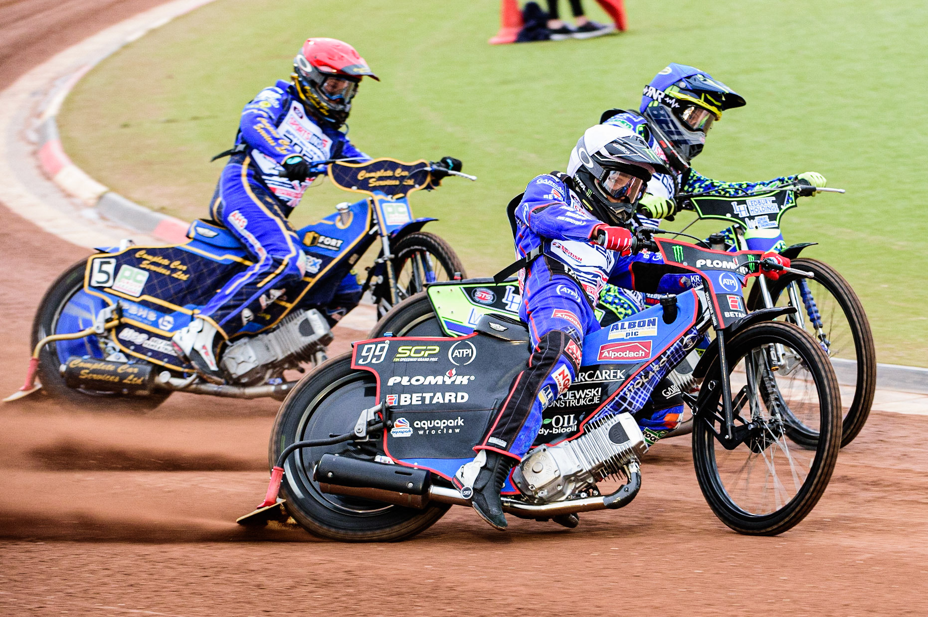 Dan Bewley  (White) outside Paul Starke  (Blue) and Kyle Howarth  (Red) during the Sports Insure British Speedway Championship Final at the National Speedway Stadium, Bellevue, Manchester, England on Monday 1st August 2022. (Photo by: Ian Charles | MI News)