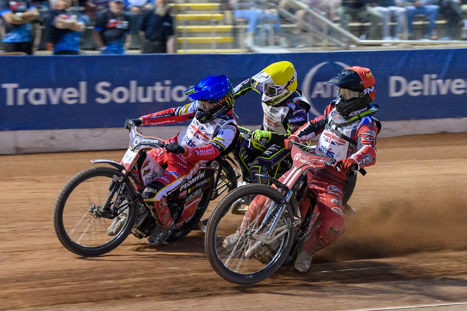 Dan Bewley in Blue leading Dan Thompson in Red and Tom Brennan in Yellow during the Attis Insurance Sports Division British Final at the National Speedway Stadium, Manchester on Monday 12th May 2025. (Photo: Ian Charles | MI News)