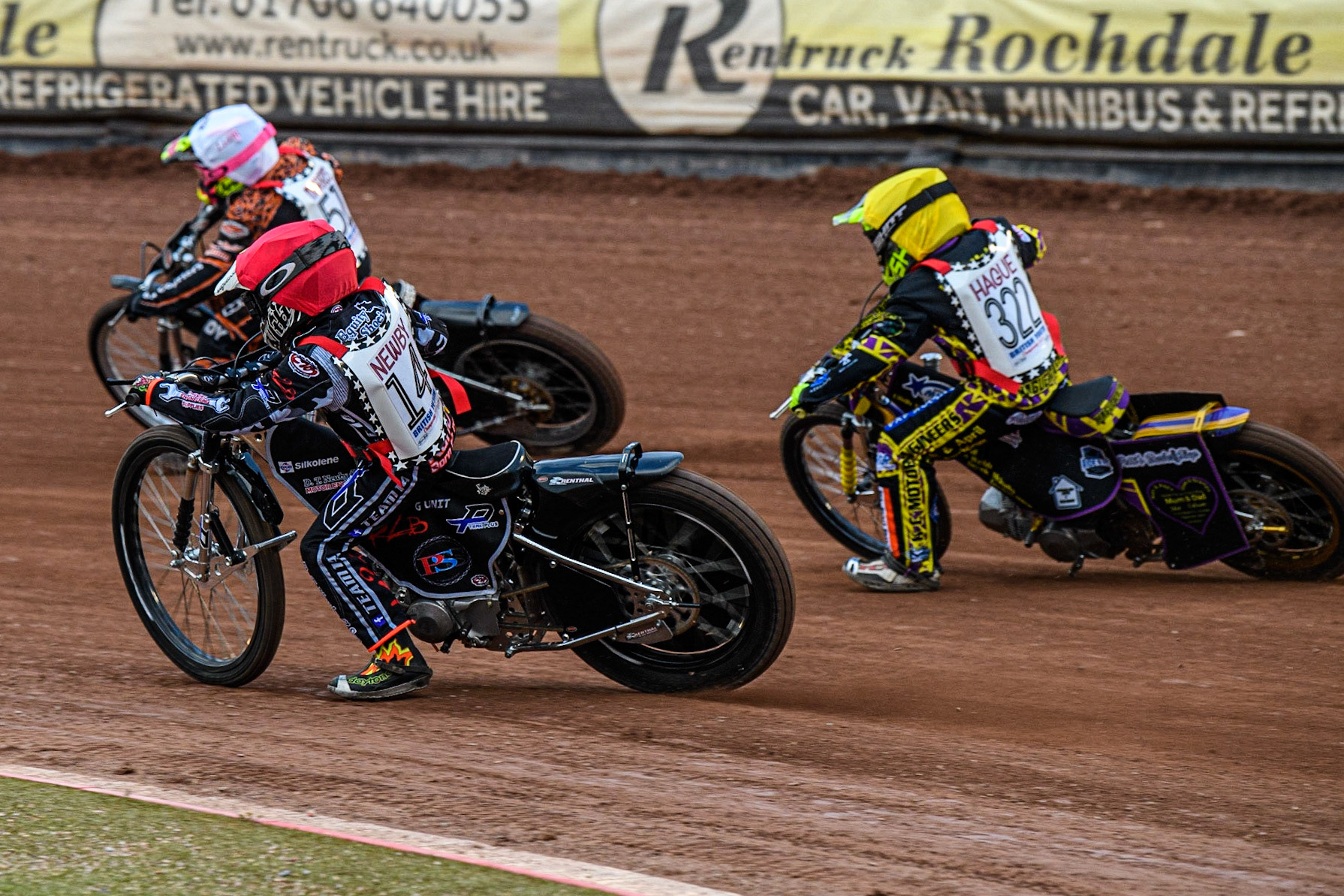 Kane Newby  (Red) inside Lewis Hague  (Yellow) as they chase Liam Morris  (White) during the British Youth Championships at the National Speedway Stadium, Manchester on Friday 12th May 2023. (Photo: Ian Charles | MI News)