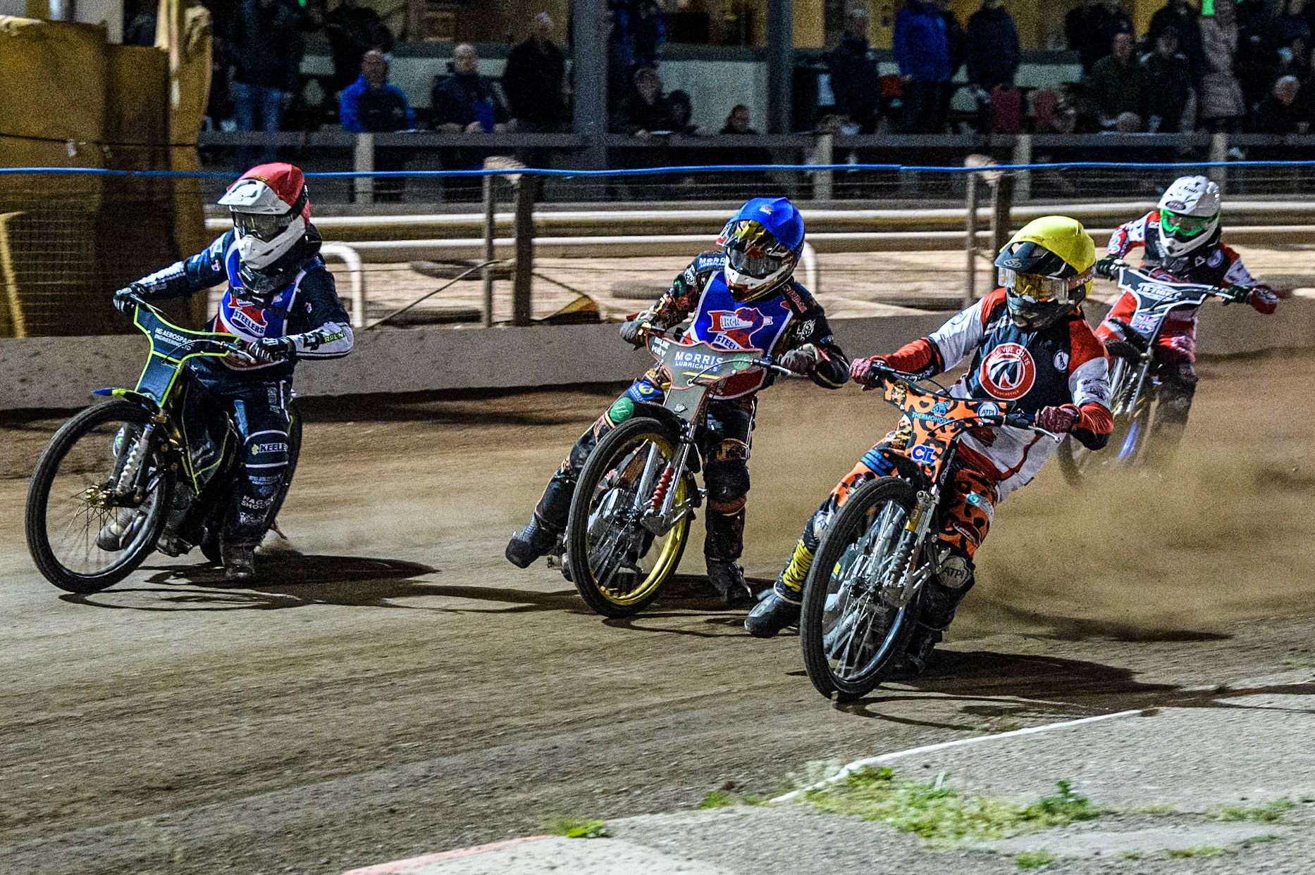 Belle Vue Colts' Guest Rider Cooper Rushen in Yellow rides inside Steelers' Nathan Ablitt in Red and \’ste2\ in Blue with Belle Vue Colts' Jack Shimelt in White behind during the WSRA National Development League match between Steelers and Belle Vue Colts at Owlerton Stadium, Sheffield on Monday 5th May 2025. (Photo: Ian Charles | MI News)